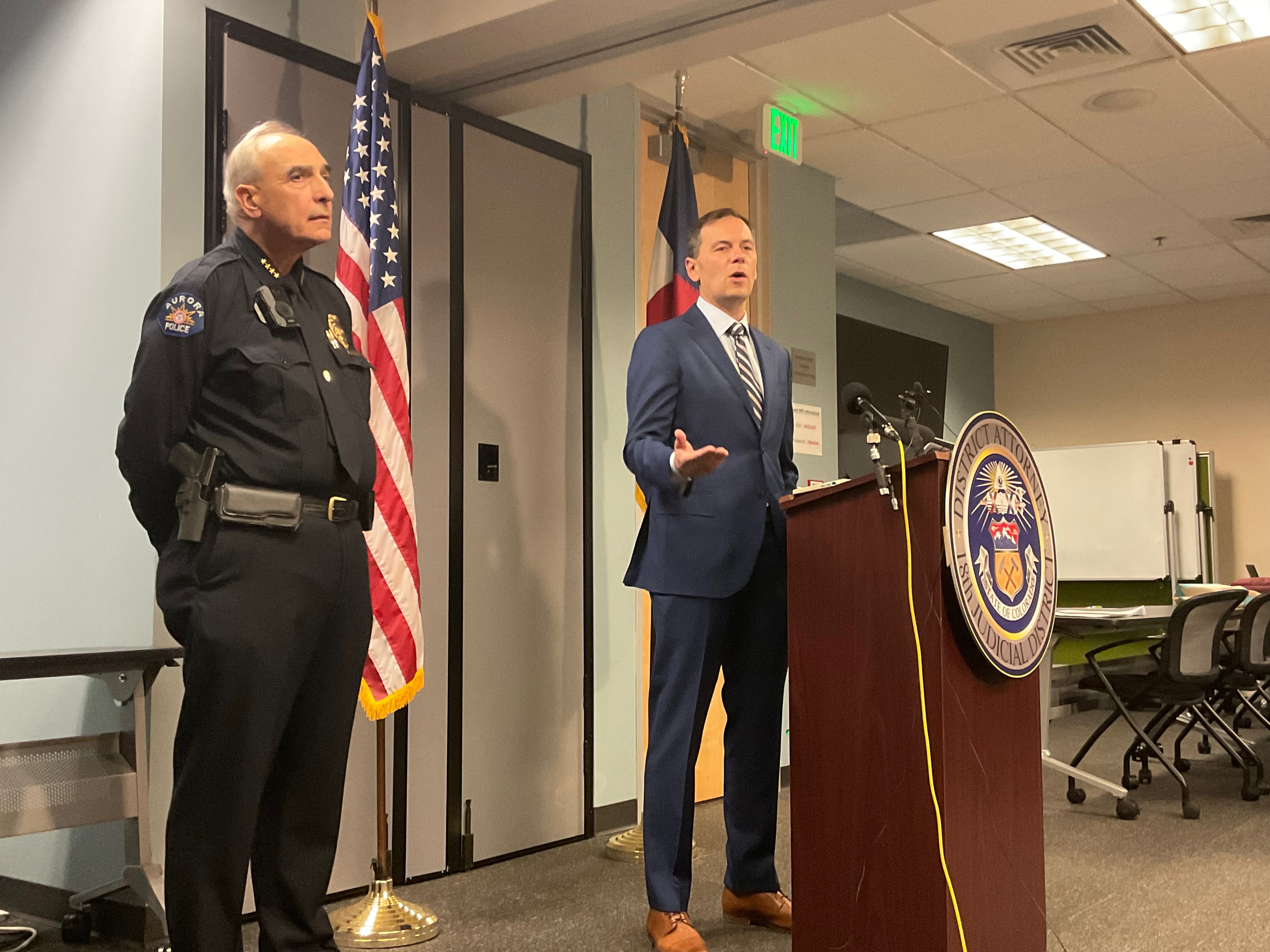 John Kellner, the district attorney for Colorado's 18th Judicial District speaks at a press conference announcing the arrest of six people who ran a car theft and fraud ring on Oct. 19, 2022. Interim Aurora Police Chief Daniel Oates stands next to Kellner. (Alex Edwards/The Denver Gazette) (AlexanderEdwardsBusiness Reporteralex.edwards@gazette.comhttps://secure.gravatar.com/avatar/dbaa50cc8a9183e280c297e3afa72ace?d=mm&r=g)