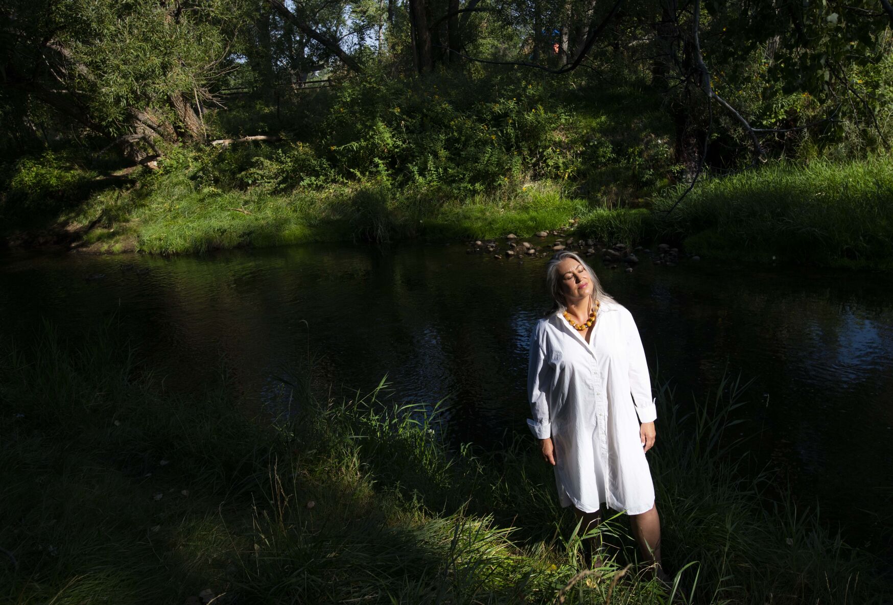Erin finds peace in Prospect Park, near her home. She lost custody of her now-13-year-old daughter in 2020 during an ongoing fight that has lasted more than a decade. She stands in the morning sun on Thursday, Sept. 8, 2022. (The Gazette, Christian Murdock) (ChristianMurdockchristian.murdock@gazette.comhttps://secure.gravatar.com/avatar/7b418fa9a684d03a433f79e3e5065029?d=mm&r=g)