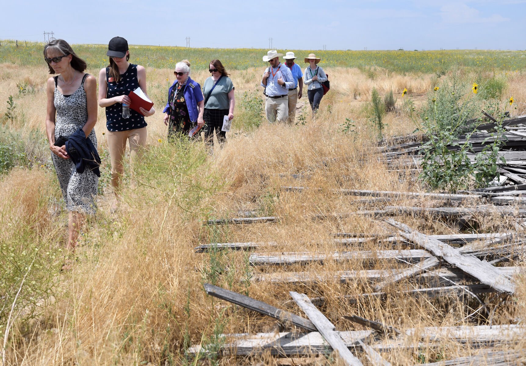 WELD COUNTY, CO - JULY 21: Members of the Colorado General Assembly join Weld County officials on an historic tour of the Dearfield townsite located about 24 miles miles east of Greeley on July 21, 2021 in Weld County, Colorado. The group learned about the Deerfield Dream Project that emphasizes, archeological, historical, and environmental studies as well as protection of historic buildings and preservation of the early 20th Century African American colony of Dearfield. (Photo By Kathryn Scott) (Kathryn Scott)