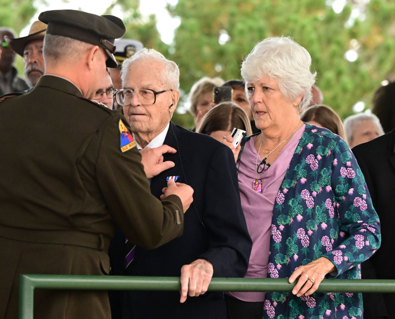 Maj. Gen. Charles Costanza, Commanding General of the 3rd I.D., presents the Silver Star, to World War II veteran Sergeant First Class Harold Nelson during a ceremony at Ft. Carson on Tuesday, Oct. 4, 2022. Nelson’s daughter, Carolee Soden (right), was emotional to see this day finally arrive. Nelson, 107 and a resident of Denver, was drafted into the United States Army in 1941 from Fort Crook, Nebraska. (Photo by Jerilee Bennett, The Gazette)
