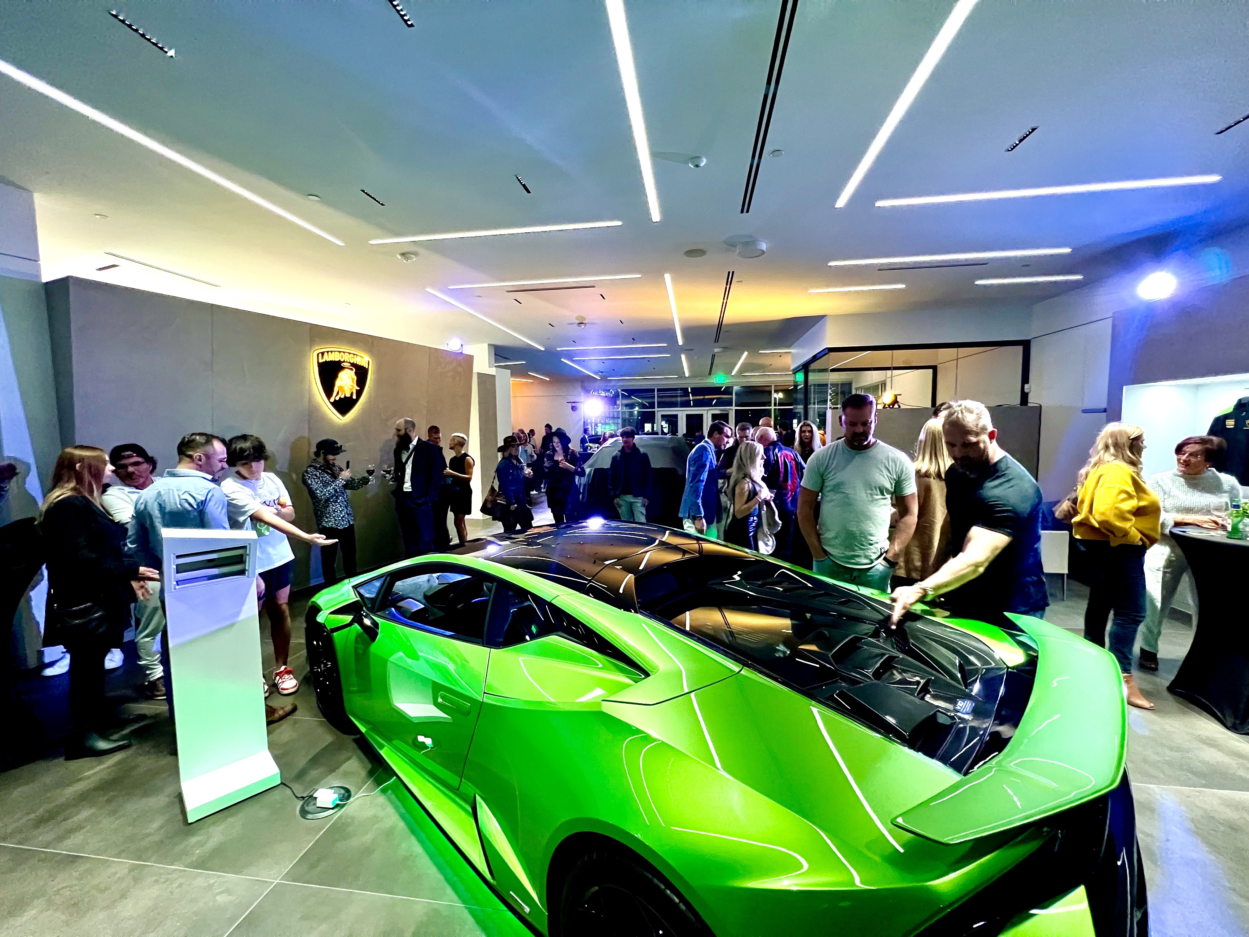 Lamborghini’s new Denver showroom was filled with guests, leaders and dealers on Wednesday evening to celebrate its opening with a ribbon cutting and presentation by owner Mike Ward and Andrea Baldi, CEO of Lamborghini North America. (SavannahMehrtenssavannah.mehrtens@denvergazette.comhttps://secure.gravatar.com/avatar/e0e72b1f57c381b73731db78749ceca8?d=mm&r=g)