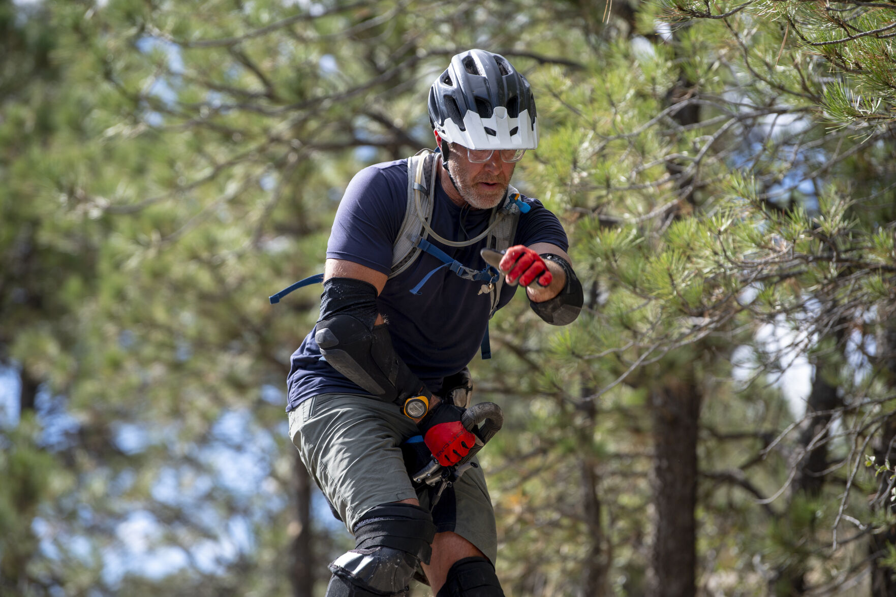 As he rides down a rocky line at Ute Valley Park, Rob Urban focuses on the obstacles ahead of him while balancing on his unicycle on Wednesday, Sept. 28, 2022. (The Gazette, Parker Seibold) (Parker Seibold/ The Gazette)
