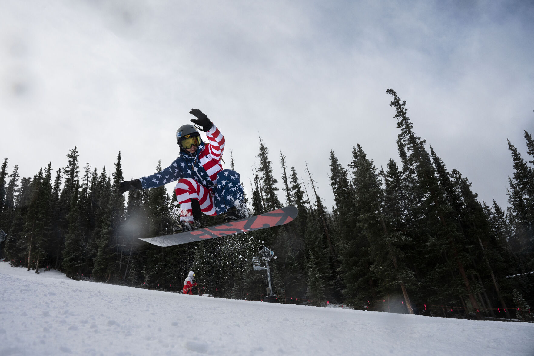 Andrew Eber catches air on the High Noon run during opening day at Arapahoe Basin Ski Area on Sunday, Oct. 23, 2022, near Dillon, Colo. (Timothy Hurst/The Gazette) (TIMOTHY HURST/DENVER GAZETTE)