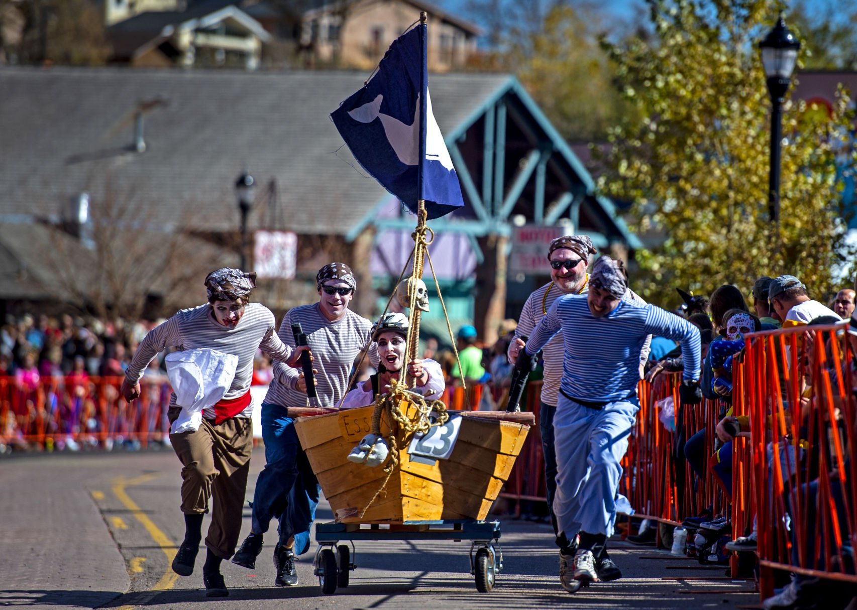 The SS Essex races down Manitou Avenue while people cheer them on during the 2019 annual Emma Crawford Coffin Races in Manitou Springs. (Parker Seibold/The Gazette)