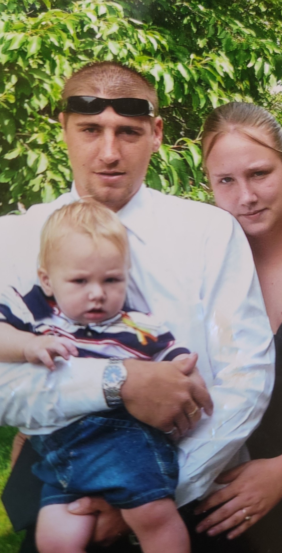 James Weatherbee II holding ten month old James Weatherbee III with his wife, Erica, standing behind him. The couple eventually separated but were sharing parental duties when Weatherbee died. The younger James is now 14 years old. (Erica Rankin)