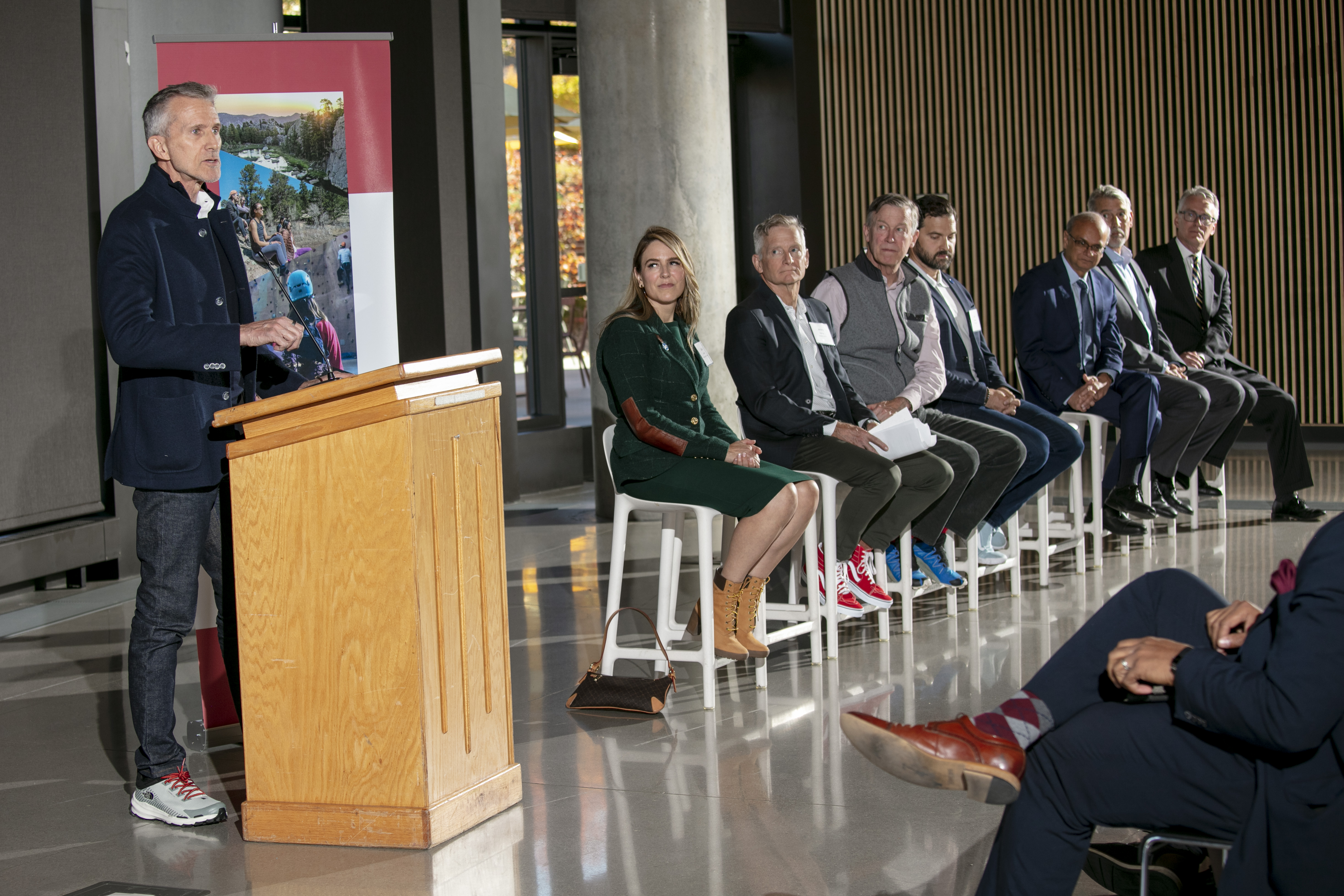 Steve Rendle, left, chairman, president and CEO of The VF Foundation, speaks during the unveiling of the University of Denver’s Leadership in Outdoor Recreation Industry program that will 