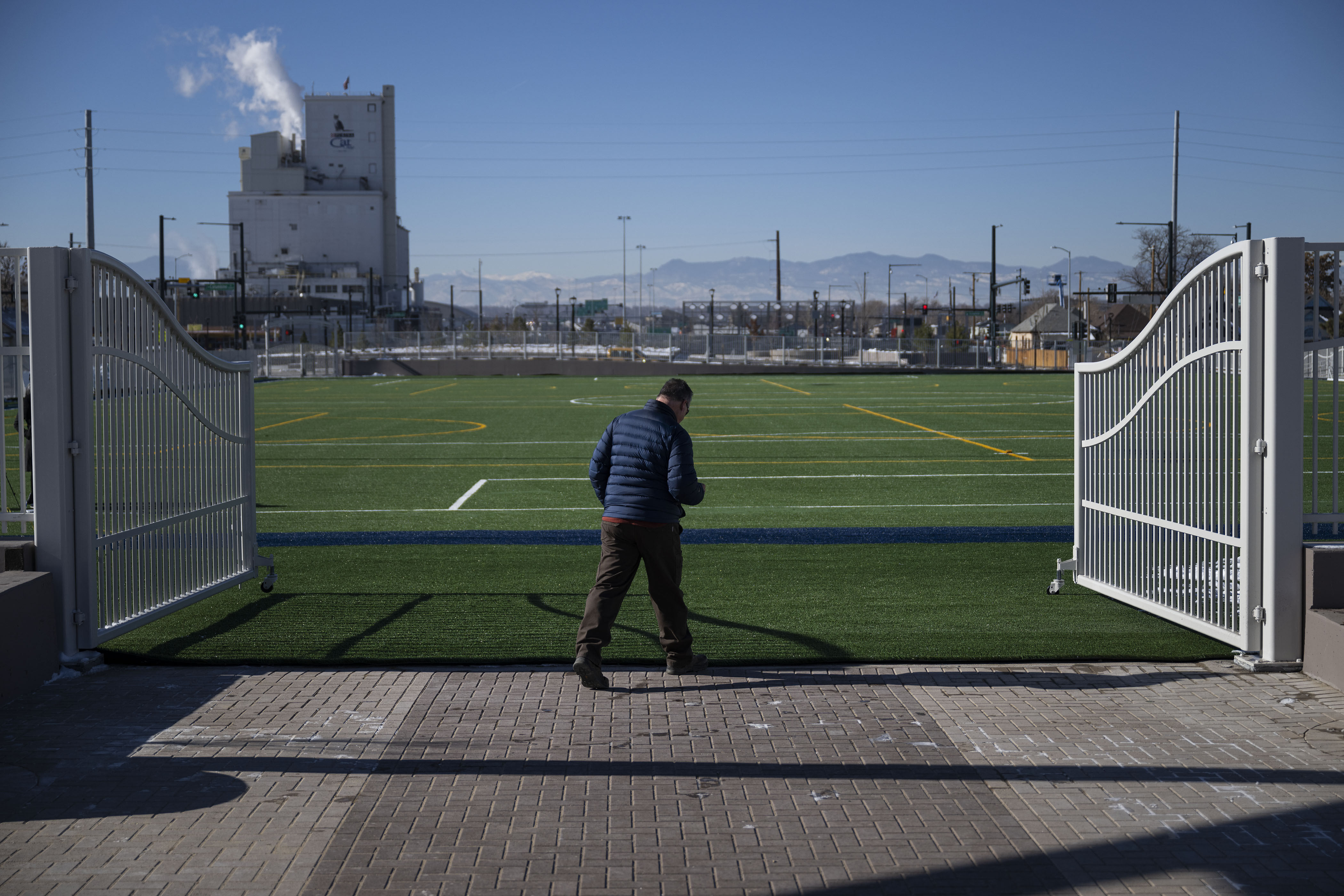Recently retired CDOT employee Ron Dickey steps onto the new soccer field after a ribbon-cutting event to celebrate the opening of the 4-acre Cover Park over Interstate 70 between Brighton Boulevard and Colorado Boulevard on Wednesday, Nov. 30, 2022, in Denver, Colo. (Timothy Hurst/The Gazette) (TimHursttim.hurst@gazette.comhttps://secure.gravatar.com/avatar/aca82bd62b4ee425c598527cd6faa1b1?d=mm&r=g)