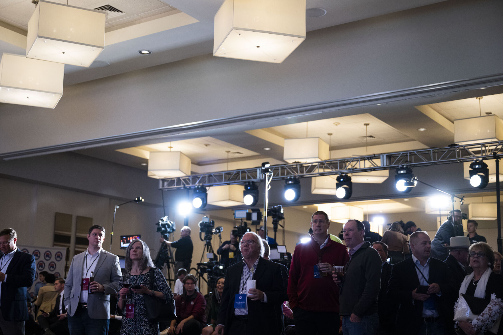 Audience members and members of the media watch nation results roll in on a big screen during the Colorado GOP Election Night Party on Tuesday, Nov. 8, 2022, at the DoubleTree by Hilton DTC in Greenwood Village, Colo. (Timothy Hurst/The Gazette) (TIMOTHY HURST/DENVER GAZETTE)