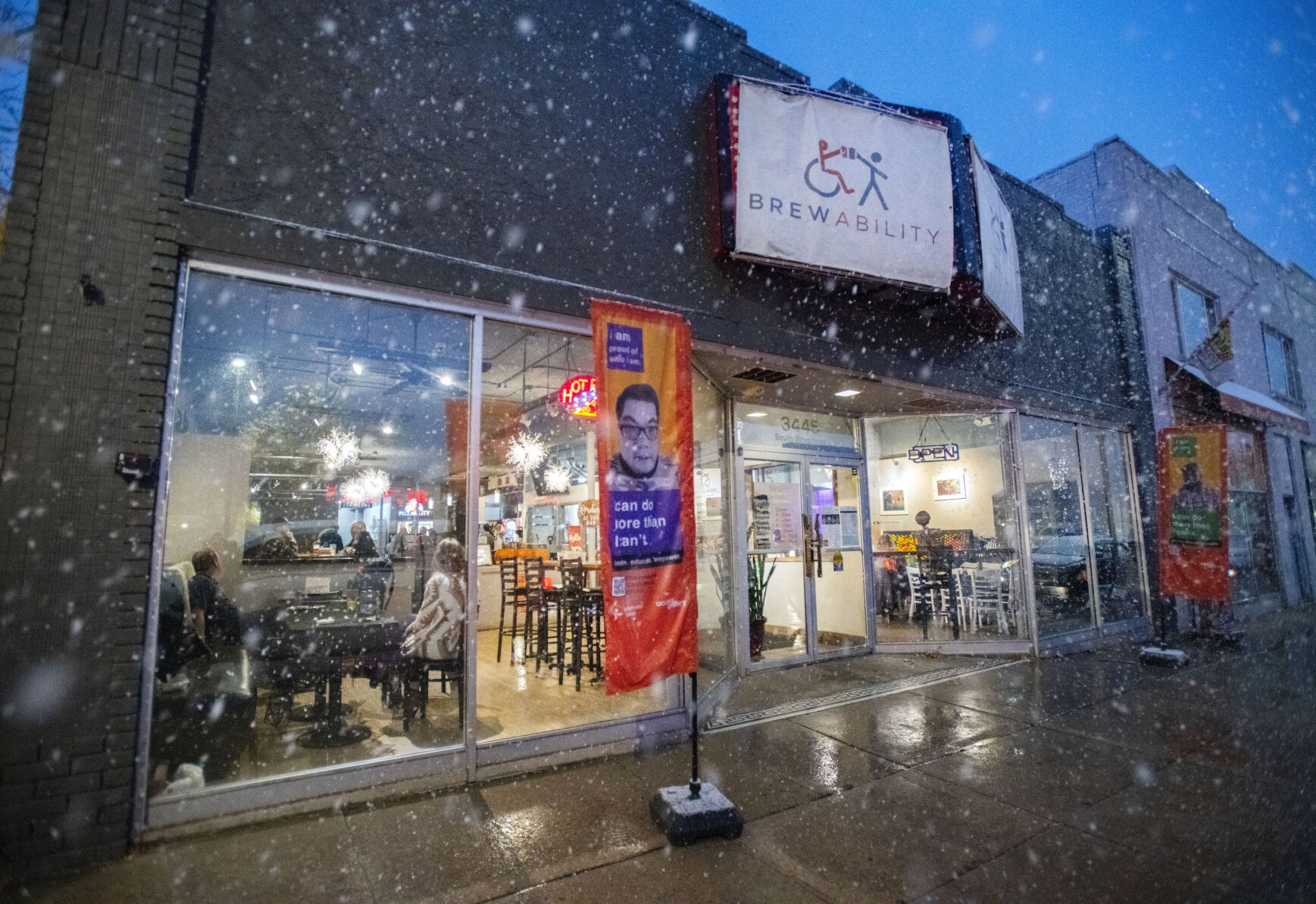 Customers sit in the Brewability brewpub and pizzaria on a snowy night. (Christian Murdock,The Gazette)