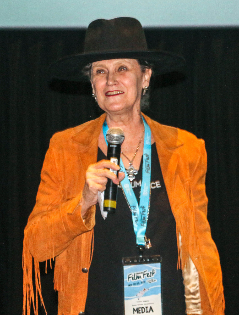 A Denver Film Festival rep dressed the part to introduce the film 'Quantum Cowboys.' (JOHN MOORE/DENVER GAZETTE)