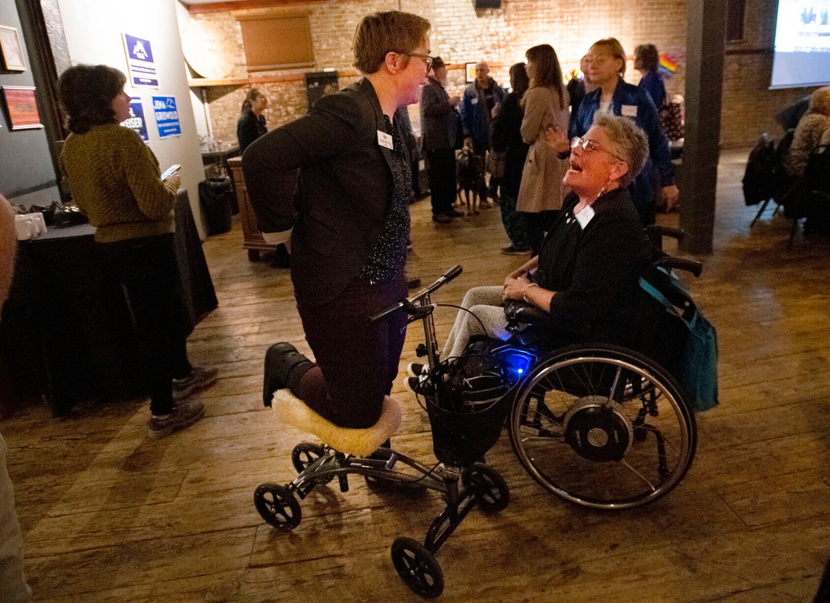 Democratic candidate for House District 16 Stephanie Vigil visits with a supporter Tuesday, Nov. 8, 2022, during the El Paso County Democratic Party watch party at the Warehouse restaurant in Colorado Springs. (The Gazette, Christian Murdock) (Christian Murdock/The Gazette)