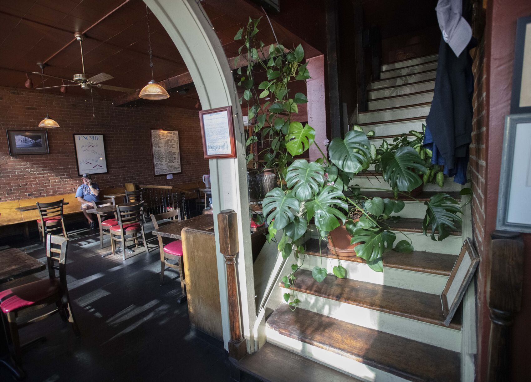 A staircase leads to nowhere in My Brother’s Bar Thursday, Oct. 6, 2022. When Denver’s oldest bar opened in 1873 upstairs was a boarding house. The second floor was later torn down after it was old and unsafe. (The Gazette, Christian Murdock) (Christian Murdock/The Gazette)