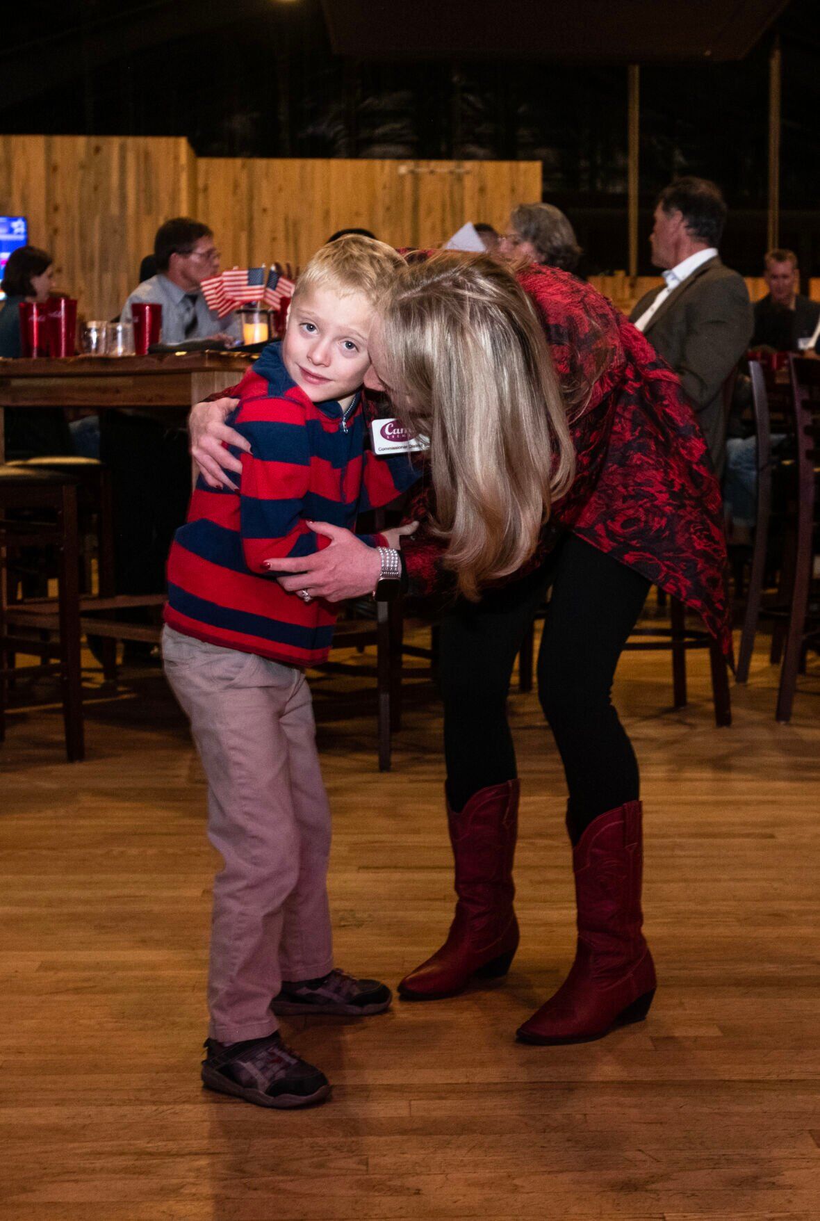 Cami Bremer shares a moment with her son Struthers on the dace floor during the El Paso County Republican’s election watch party at Boot Barn Hall at Bourbon Brothers on Nov. 8, 2022. (The Gazette, Parker Seibold) (Parker Seibold)