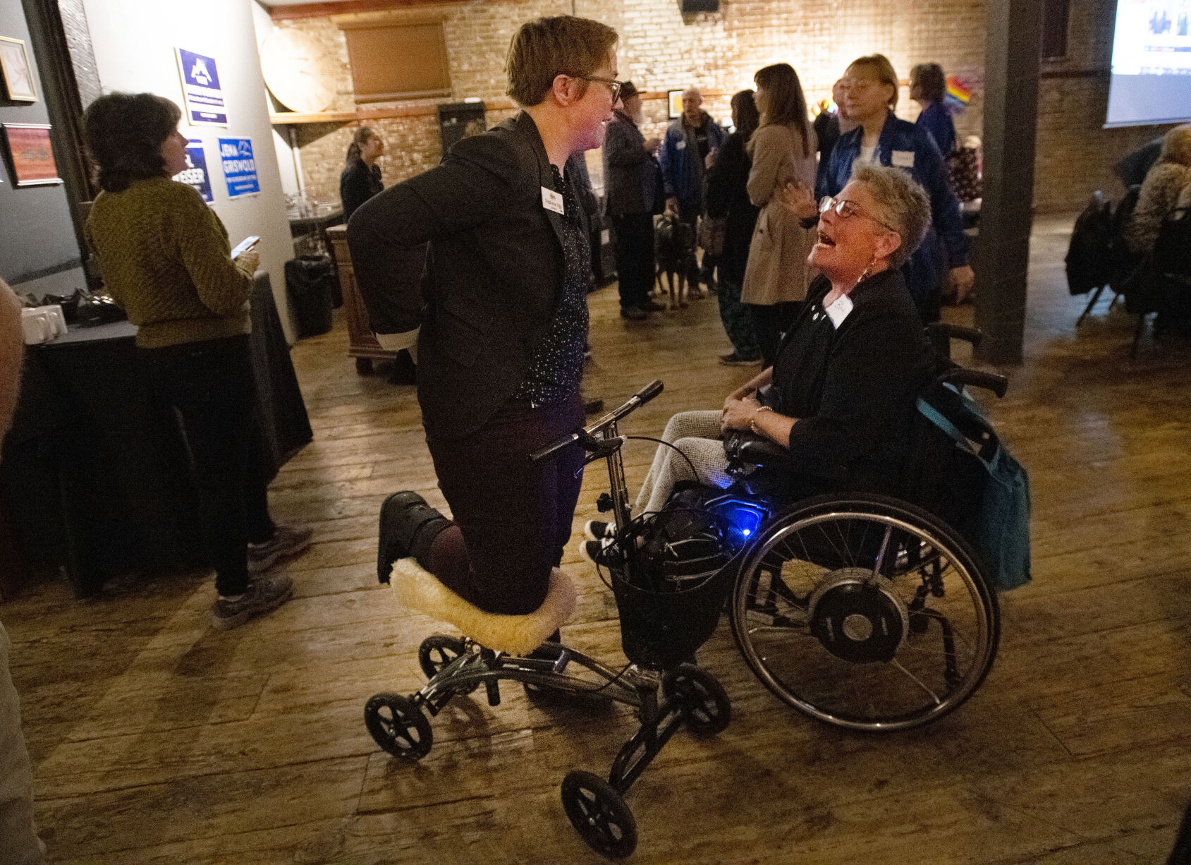 Democratic candidate for House District 16 Stephanie Vigil visits with a supporter Tuesday, Nov. 8, 2022, during the El Paso County Democratic Party watch party at the Warehouse restaurant in Colorado Springs. (The Gazette, Christian Murdock) (Christian Murdock/The Gazette)