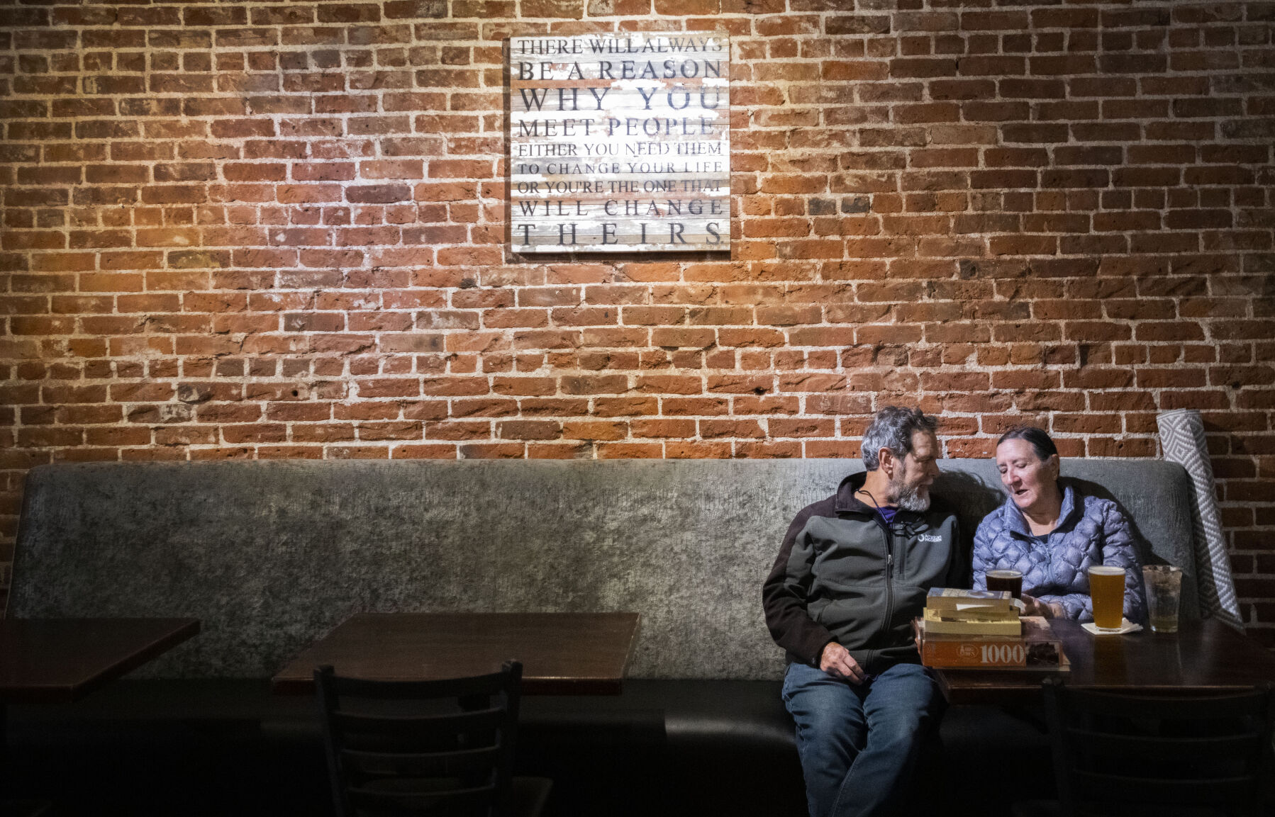 George and Patty Richardson enjoy a beer at Brewability after shopping at the bookstore next door on South Broadway in Denver. (Christian Murdock,The Gazette)