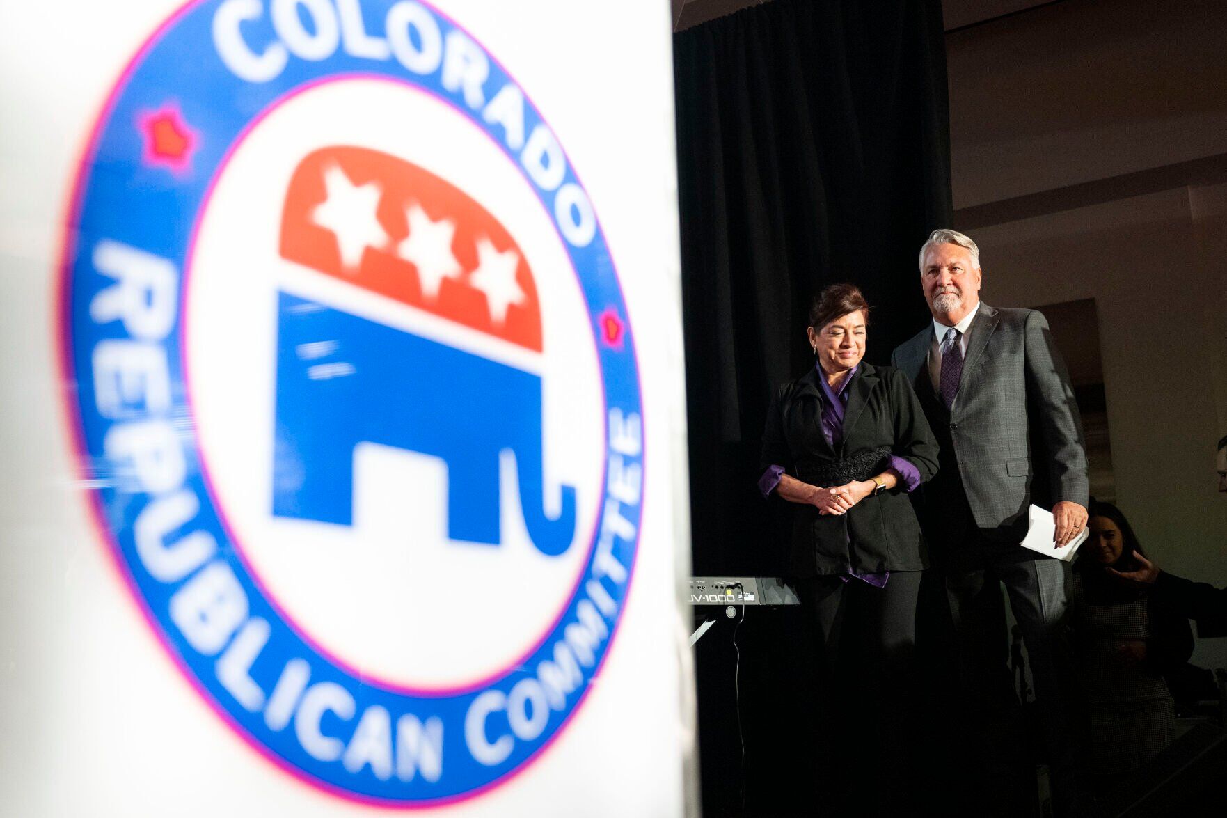 Colorado Republican U.S. Senate candidate Joe O’Dea and his wife Celeste walk on the main stage after the race was called for incumbent Michael Bennet during the Colorado GOP Election Night Party on Tuesday, Nov. 8, 2022, at the DoubleTree by Hilton DTC in Greenwood Village, Colo. (Timothy Hurst/The Gazette) (TIMOTHY HURST/DENVER GAZETTE)