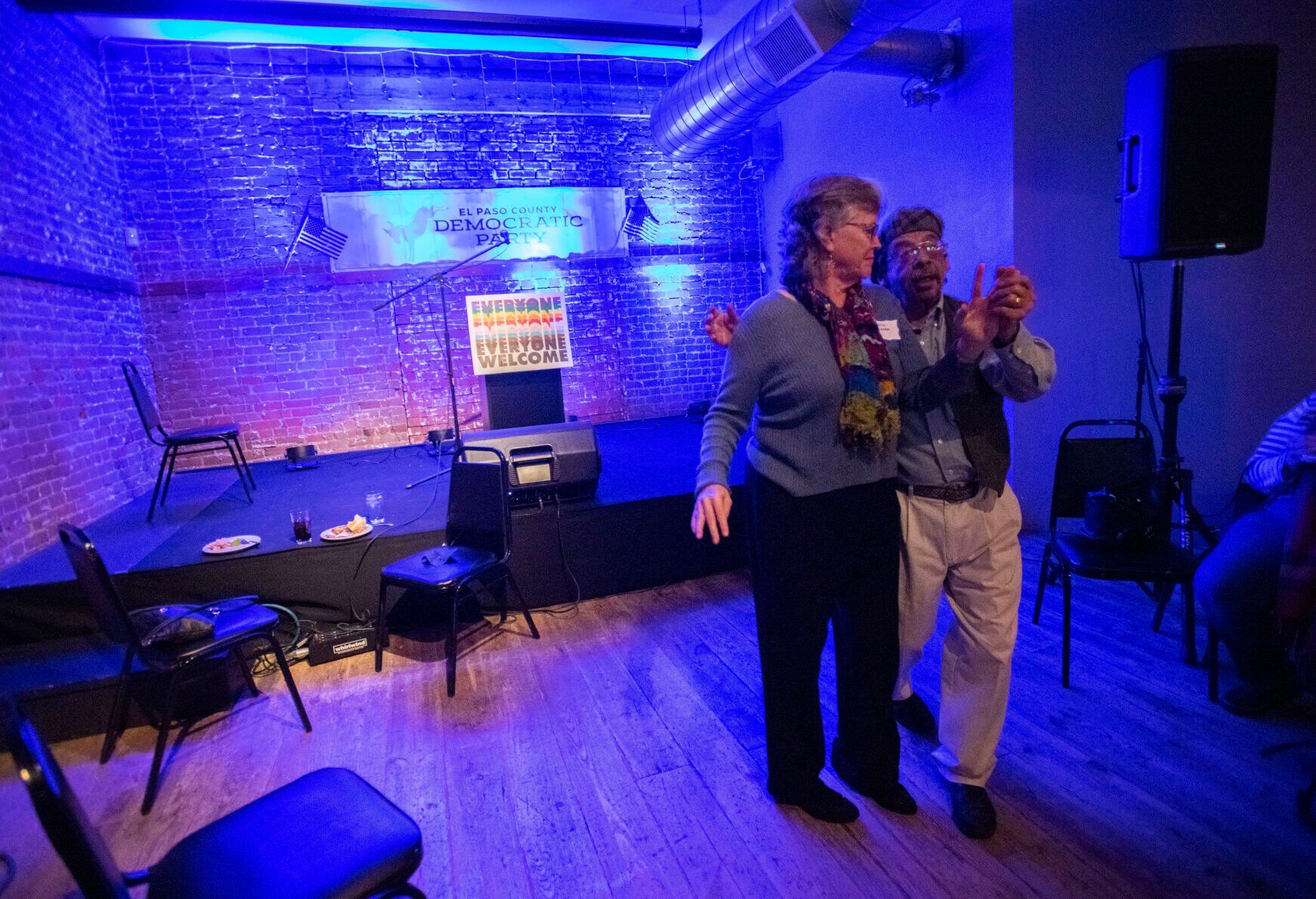 CU Regent candidate Ron Casados dances with his wife and campaign manager Barbara Casados while waiting for results Tuesday, Nov. 8, 2022, during the El Paso County Democratic Party watch party at the Warehouse restaurant in Colorado Springs. (The Gazette, Christian Murdock) (Christian Murdock/The Gazette)