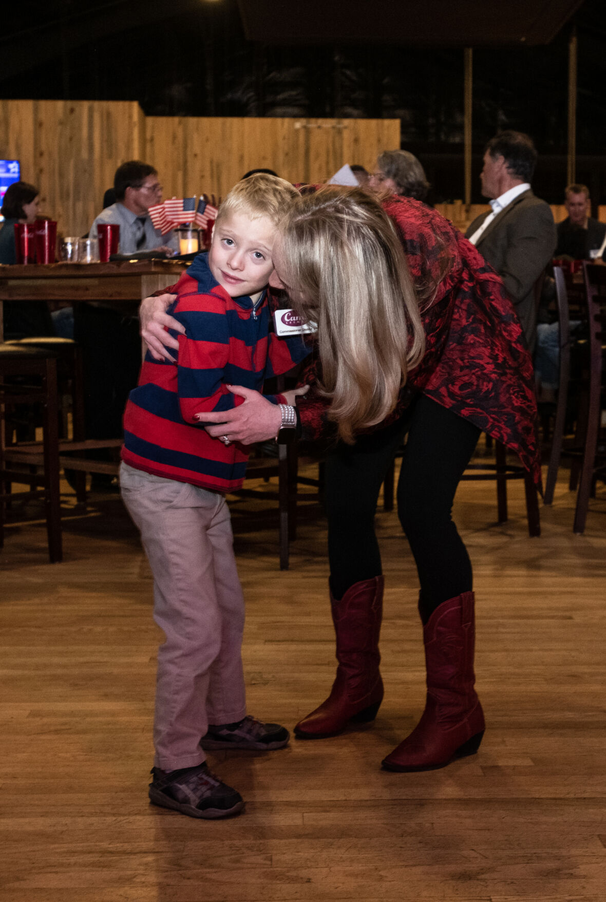 Cami Bremer shares a moment with her son Struthers on the dace floor during the El Paso County Republican’s election watch party at Boot Barn Hall at Bourbon Brothers on Nov. 8, 2022. (The Gazette, Parker Seibold) (Parker Seibold)