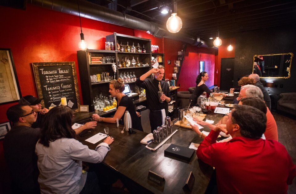 Bartenders Eliza Lovett, left, Nate Windham and Erika Mullett serve gin cocktails at Brooklyn’s on Boulder. (CHRISTIAN MURDOCK, THE GAZETTE file)