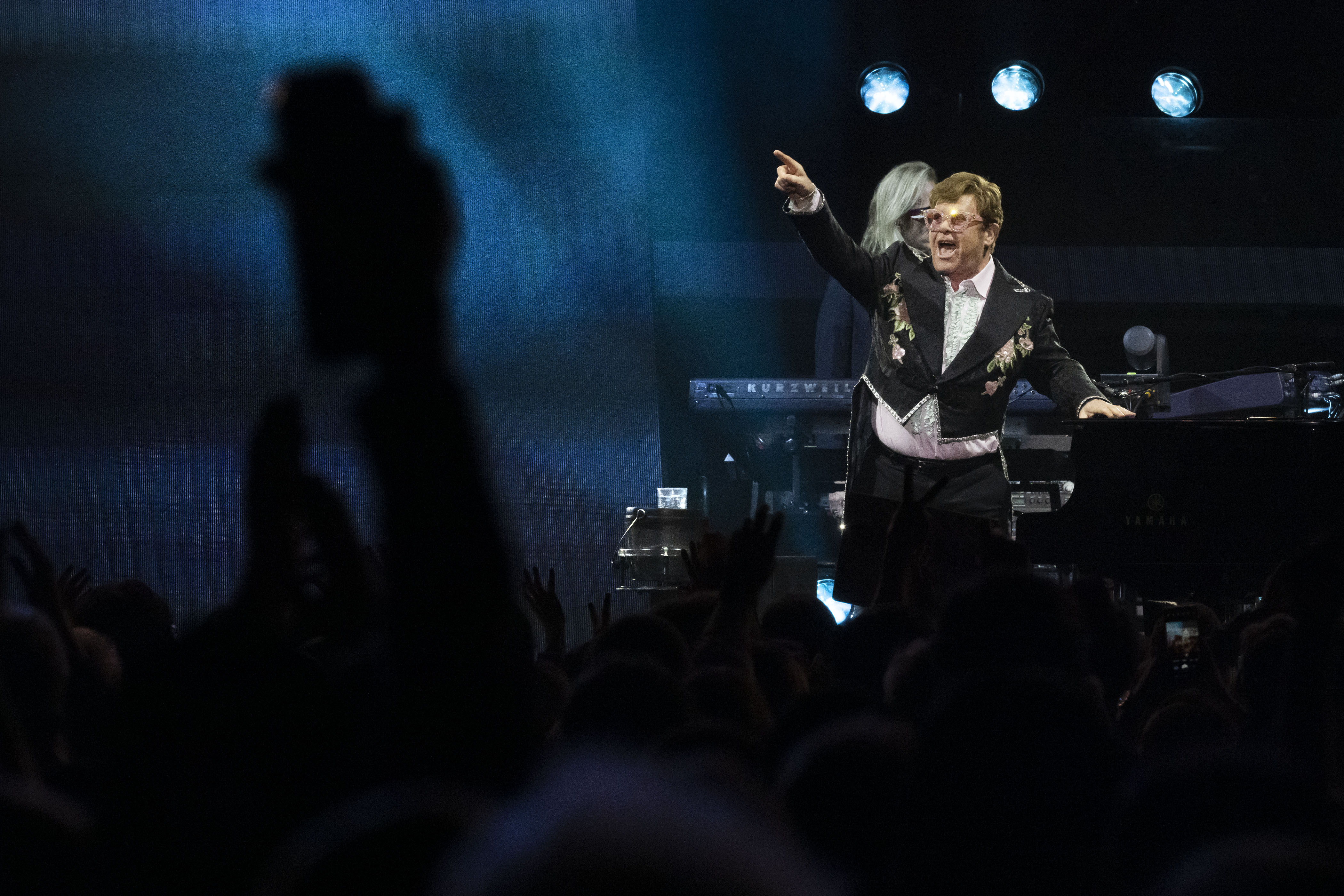 Elton John points out to the sold-out crowd after performing Tiny Dancer at Ball Arena as part of his Farewell Yellow Brick Road tour on Friday, Nov. 4, 2022, in Denver, Colo. (Timothy Hurst/The Gazette) (TimHursttim.hurst@gazette.comhttps://secure.gravatar.com/avatar/aca82bd62b4ee425c598527cd6faa1b1?d=mm&r=g)