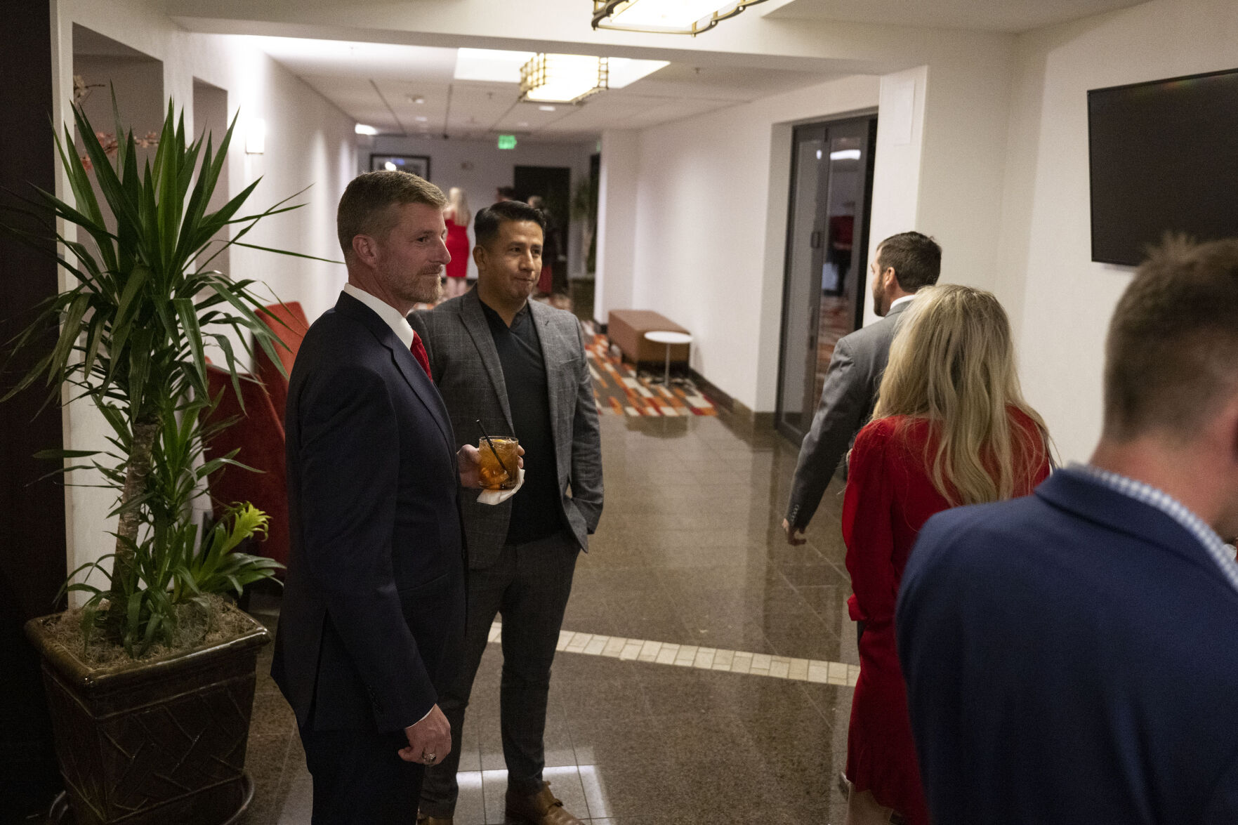 Colorado Republican 7th District congressional candidate Erik Aaland, left, waits in the hallway before heading into the VIP area during the Colorado GOP Election Night Party on Tuesday, Nov. 8, 2022, at the DoubleTree by Hilton DTC in Greenwood Village, Colo. (Timothy Hurst/The Gazette) (TIMOTHY HURST/DENVER GAZETTE)