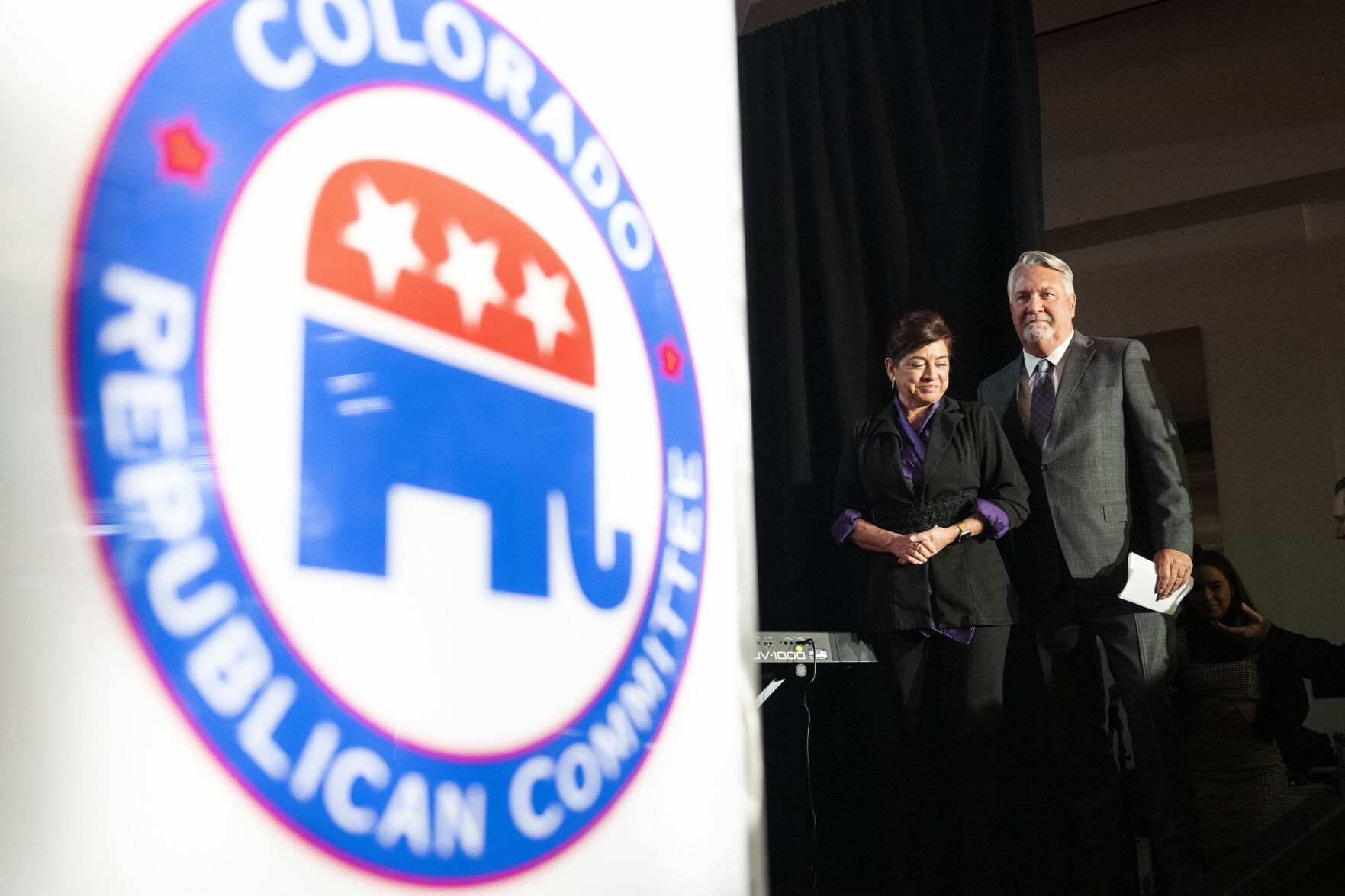 Colorado Republican U.S. Senate candidate Joe O’Dea and his wife Celeste walk on the main stage after the race was called for incumbent Michael Bennet during the Colorado GOP Election Night Party on Tuesday, Nov. 8, 2022, at the DoubleTree by Hilton DTC in Greenwood Village, Colo. (Timothy Hurst/The Gazette) (TIMOTHY HURST/DENVER GAZETTE)