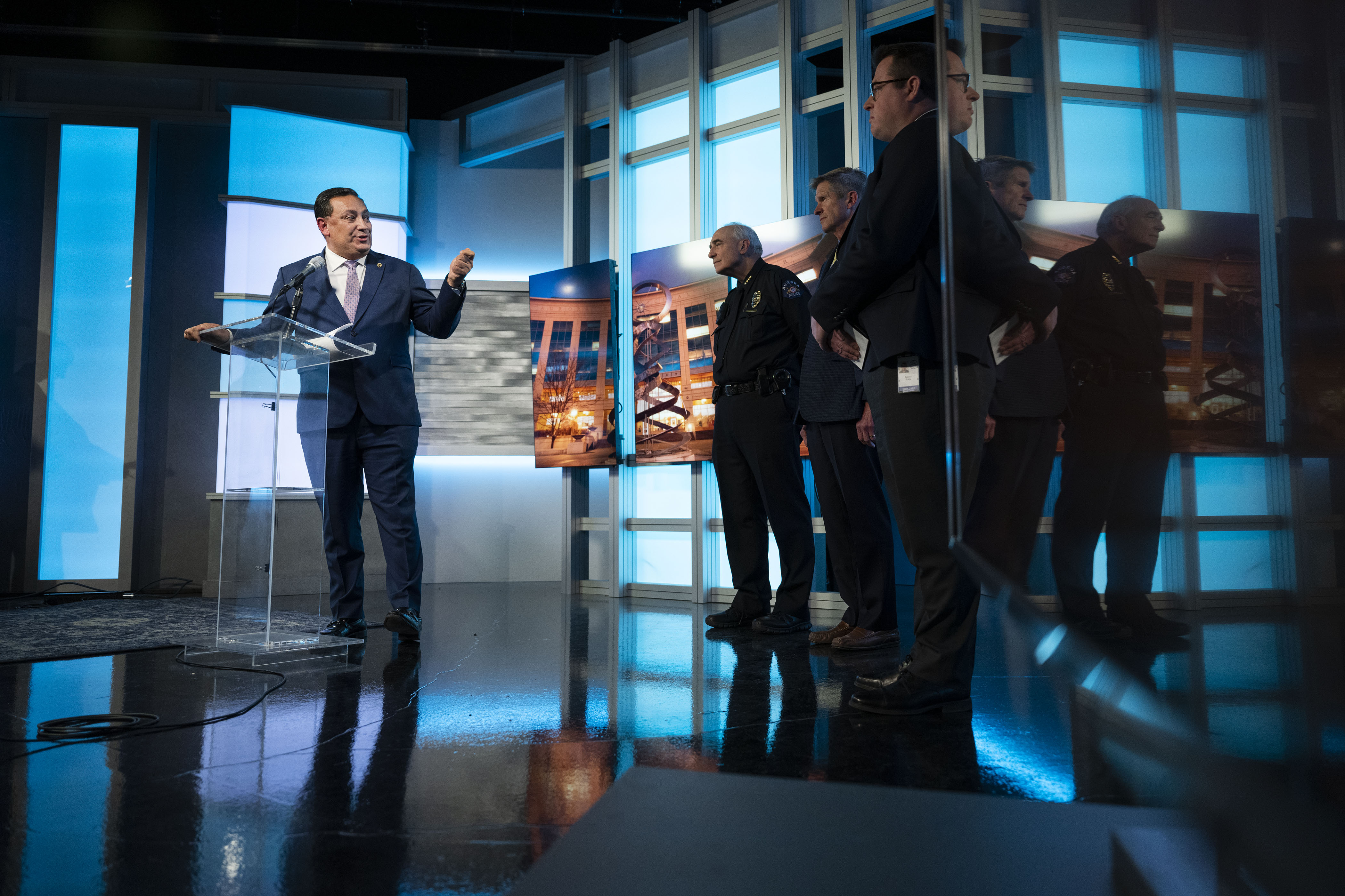 Newly-announced interim chief of police Art Acevedo inflects back toward outgoing interim chief Daniel Oates during a press conference on Tuesday, Nov. 15, 2022, in the Aurora channel 8 studio in the Aurora Municipal Center in Aurora, Colo. (Timothy Hurst/The Gazette) (TimHursttim.hurst@gazette.comhttps://secure.gravatar.com/avatar/aca82bd62b4ee425c598527cd6faa1b1?d=mm&r=g)