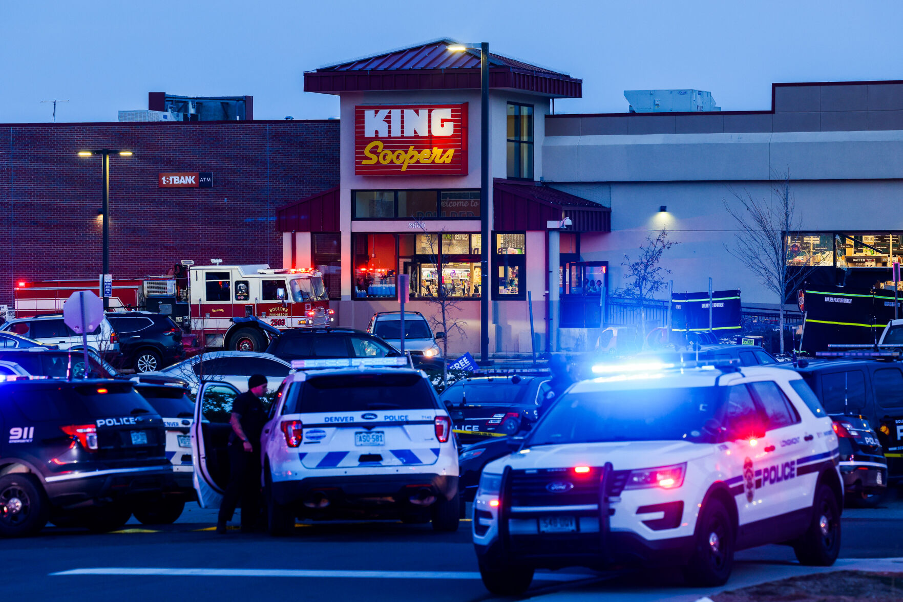 Police officers stand outside a King Soopers on Monday, March 22, 2021 in Boulder where ten people were killed in a shooting. (Michael Ciaglo/Special to The Denver Gazette) (Michael Ciaglo/Special to The De)