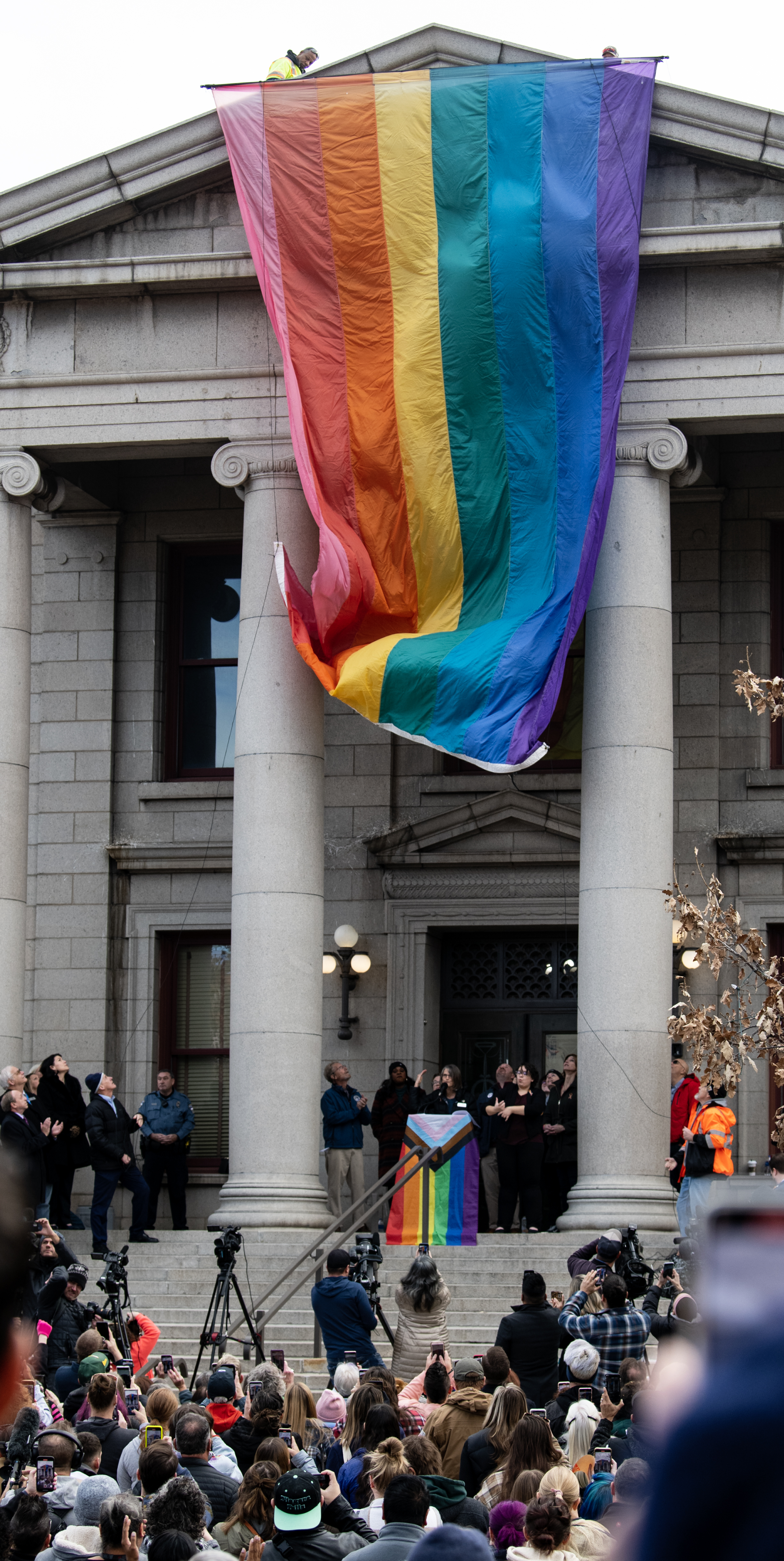 Massive Pride flag unfurls outside Colorado Springs City Hall in remembrance of Club Q victims