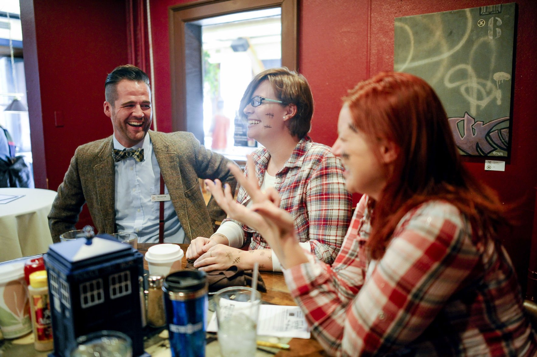 From left, Thomas Voss, dressed as the Eleventh Doctor, Carrie Kintz and Daphne White, both dressed as Amy Pond, laugh while trying to figure out a trivia answer during the Geeks Who Drink trivia night celebration of the 50th Anniversary of the Doctor Who television show Saturday, November 16, 2013 at Phantom Canyon Brewery. The Dr. Who series has aired almost 800 episodes since the first show was broadcast November 23, 1663. Michael Ciaglo, The Gazette (Michael Ciaglo, The Gazette)