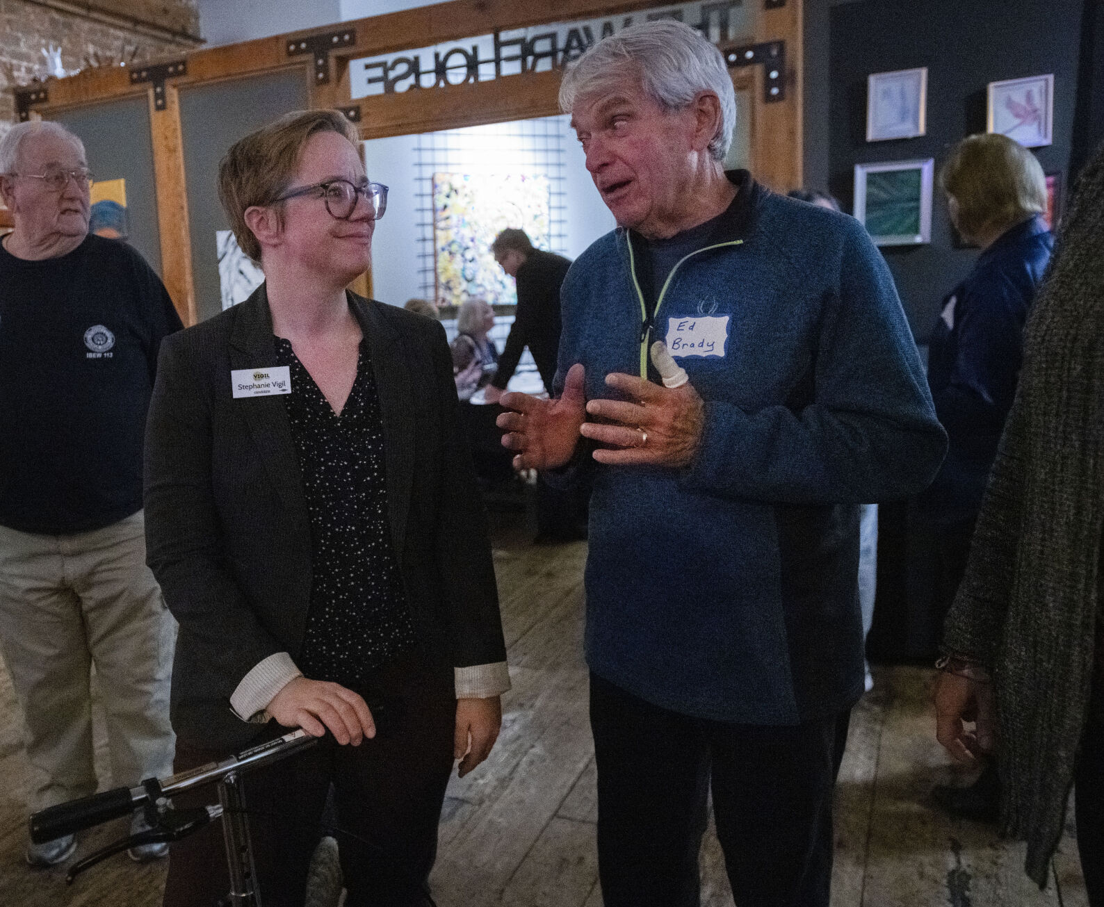 Democratic candidate for House District 16 Stephanie Vigil visits with Ed Brady Tuesday, Nov. 8, 2022, during the El Paso County Democratic Party watch party at the Warehouse restaurant in Colorado Springs. (The Gazette, Christian Murdock) (Christian Murdock/The Gazette)