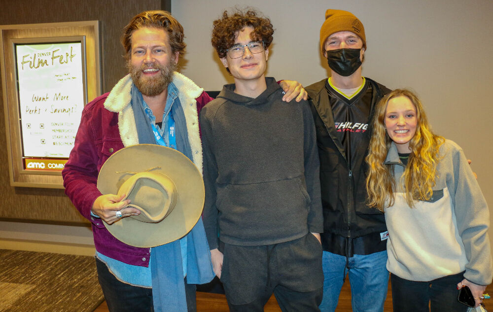 University of Colorado Film Professor Geoff Marslett greets several of his students who came to see his film 'Quantum Cowboys' wow Denver Film Festival audiences. (JOHN MOORE/DENVER GAZETTE)