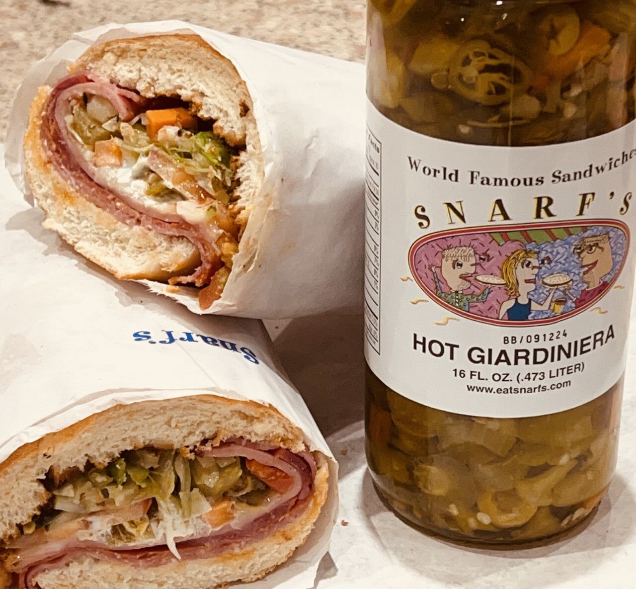 Snarf’s Sandwiches, a Boulder-based chain, offers sandwiches like the Italian and sells jars of their signature giardiniera peppers condiment. (Teresa Farney/teresa.farney@gazette.com)