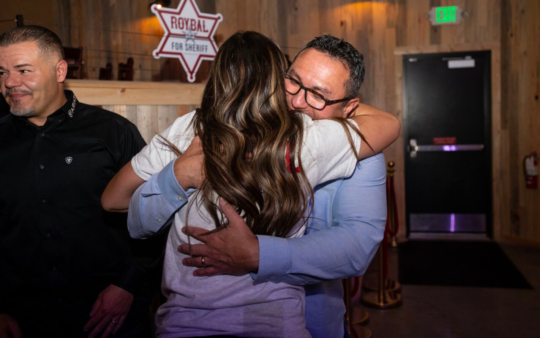 El Paso Sheriff candidate Joe Roybal shares thug with his daughter after early results show him winning the race at an Republican’s election watch party at Boot Barn Hall at Bourbon Brothers on Nov. 8, 2022. (The Gazette, Parker Seibold) (Parker Seibold)