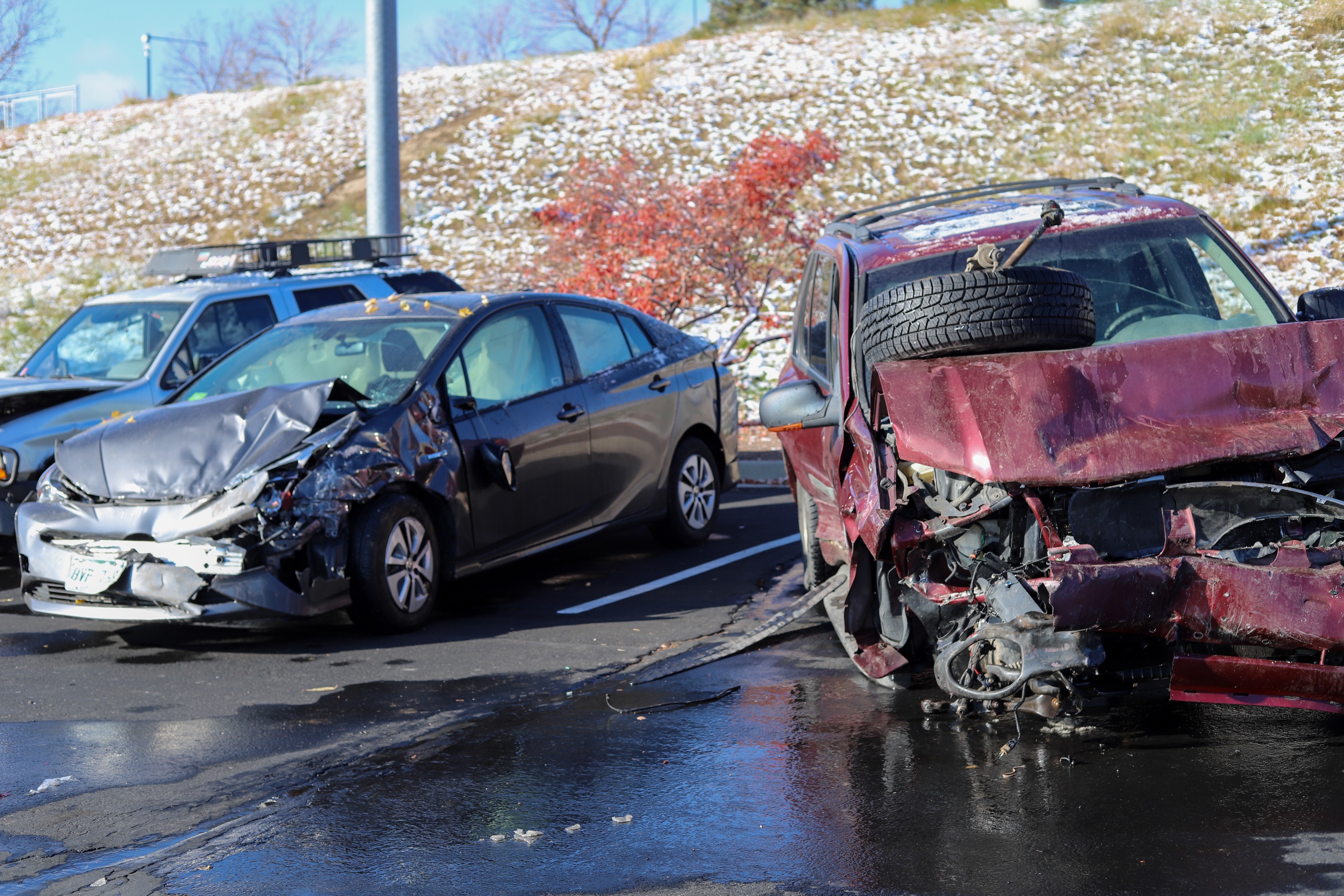 Slick roadway causes 100-car pileup in Denver Friday morning