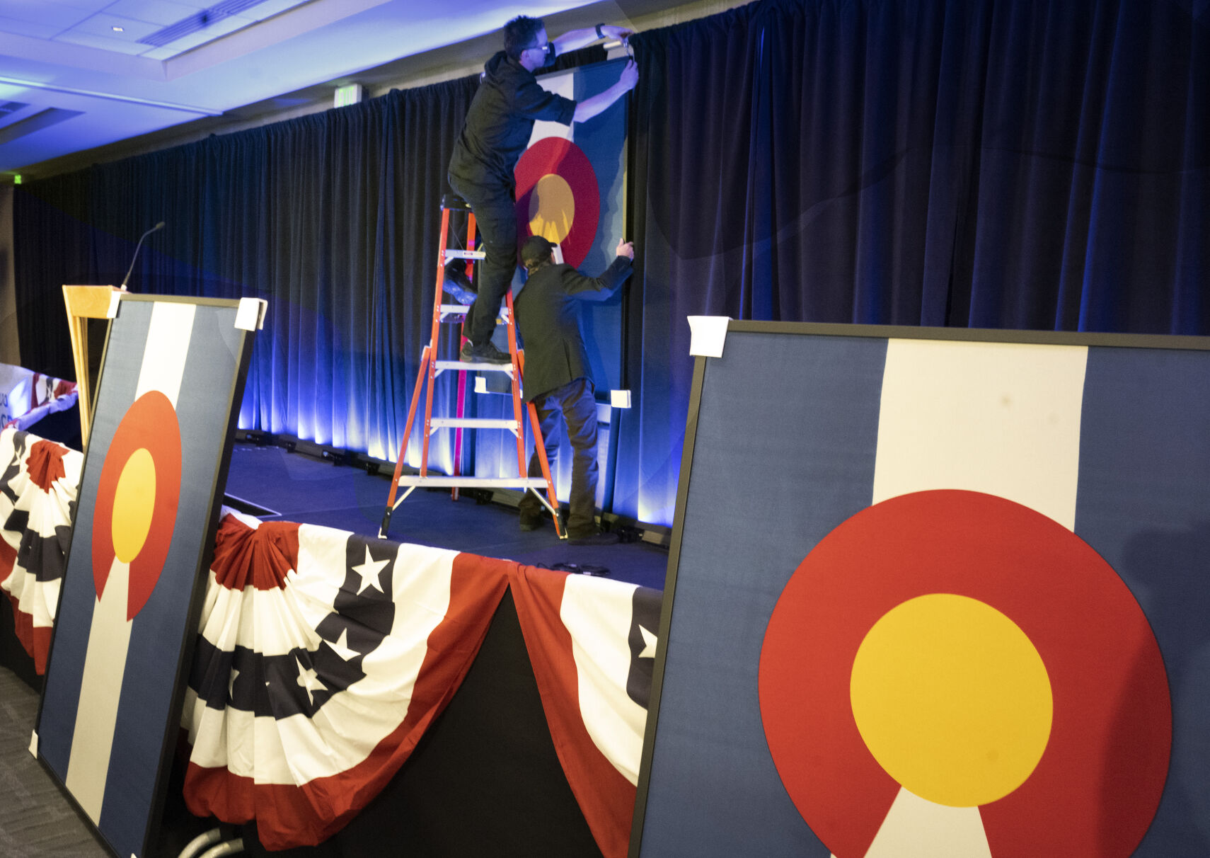 Preparations are underway at the Democratic watch party in Denver at the Art Hotel before the polls close on Tuesday, Nov. 8, 2022. This is where the Governor will make his speech after the results come in. (Photo by Jerilee Bennett, The Gazette)