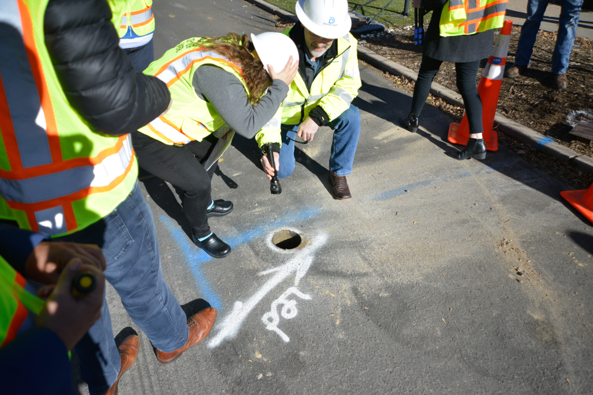 EPA Regional Administrator and Denver Water CEO Jim Lochhead examine an inspection 