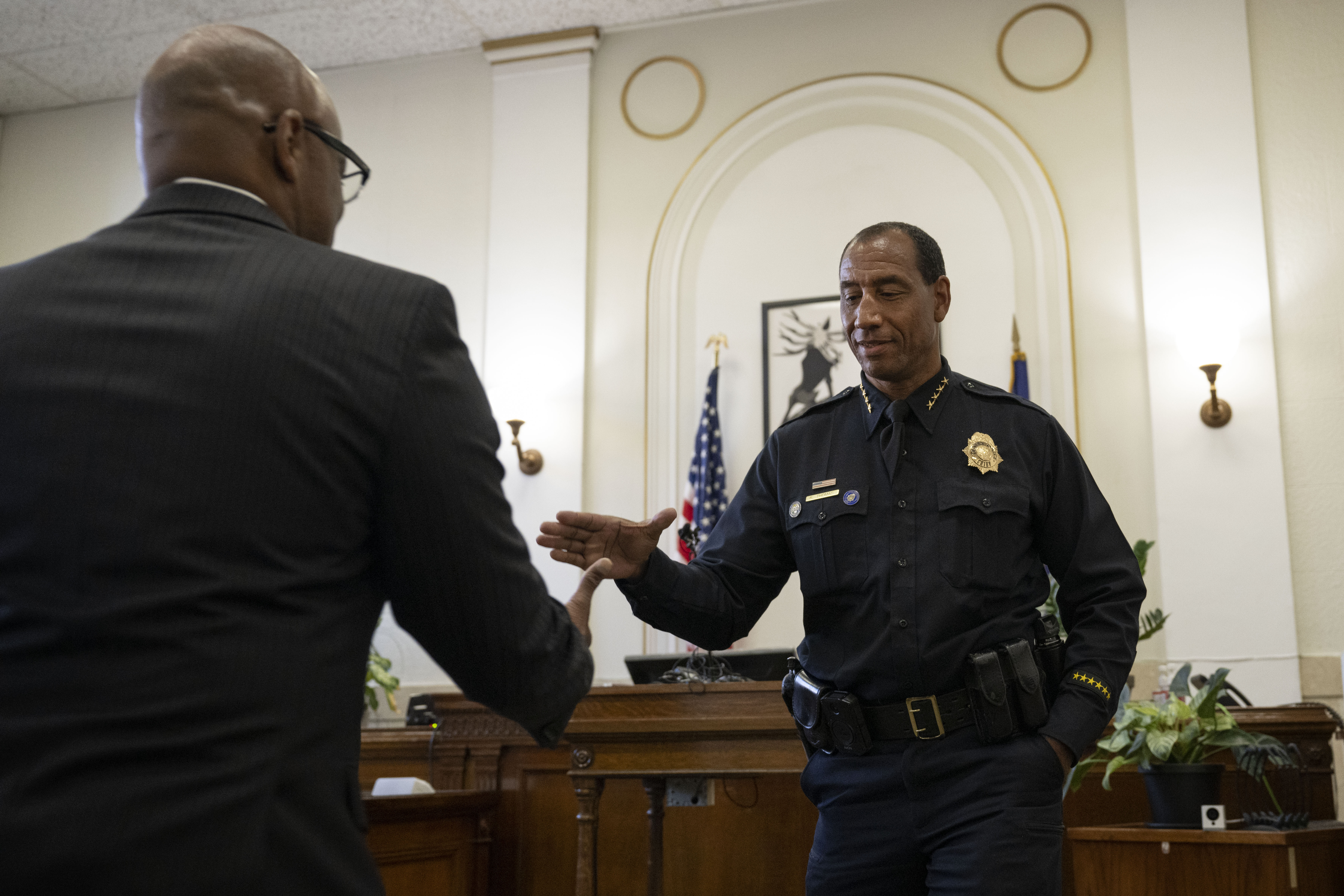 Denver mayor Michael Hancock shakes hands with soon-to-be sworn in Denver Police Department chief of police Ron Thomas on Tuesday, Oct. 18, 2022, at the Denver City and County Building in Denver, Colo. (Timothy Hurst/The Gazette) (TimHursttim.hurst@gazette.comhttps://secure.gravatar.com/avatar/aca82bd62b4ee425c598527cd6faa1b1?d=mm&r=g)