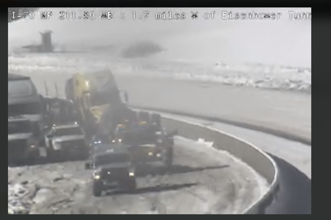 Interstate 70 in Summit County, as seen through a CDOT web camera, shows multiple vehicles stopped near the Eisenhower Tunnel, Thursday, Dec. 22, 2022. (Screen grab, CDOT web camera)