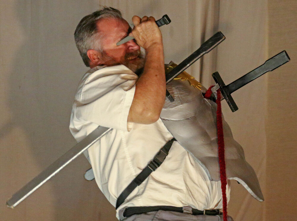 Steve Wilson stole the show with his fake death scene as Bottom in 'Shakespeare in the Wild's' production of 'A Midsummer Night's Dream.' (JOHN MOORE/THE DENVER GAZETTE)