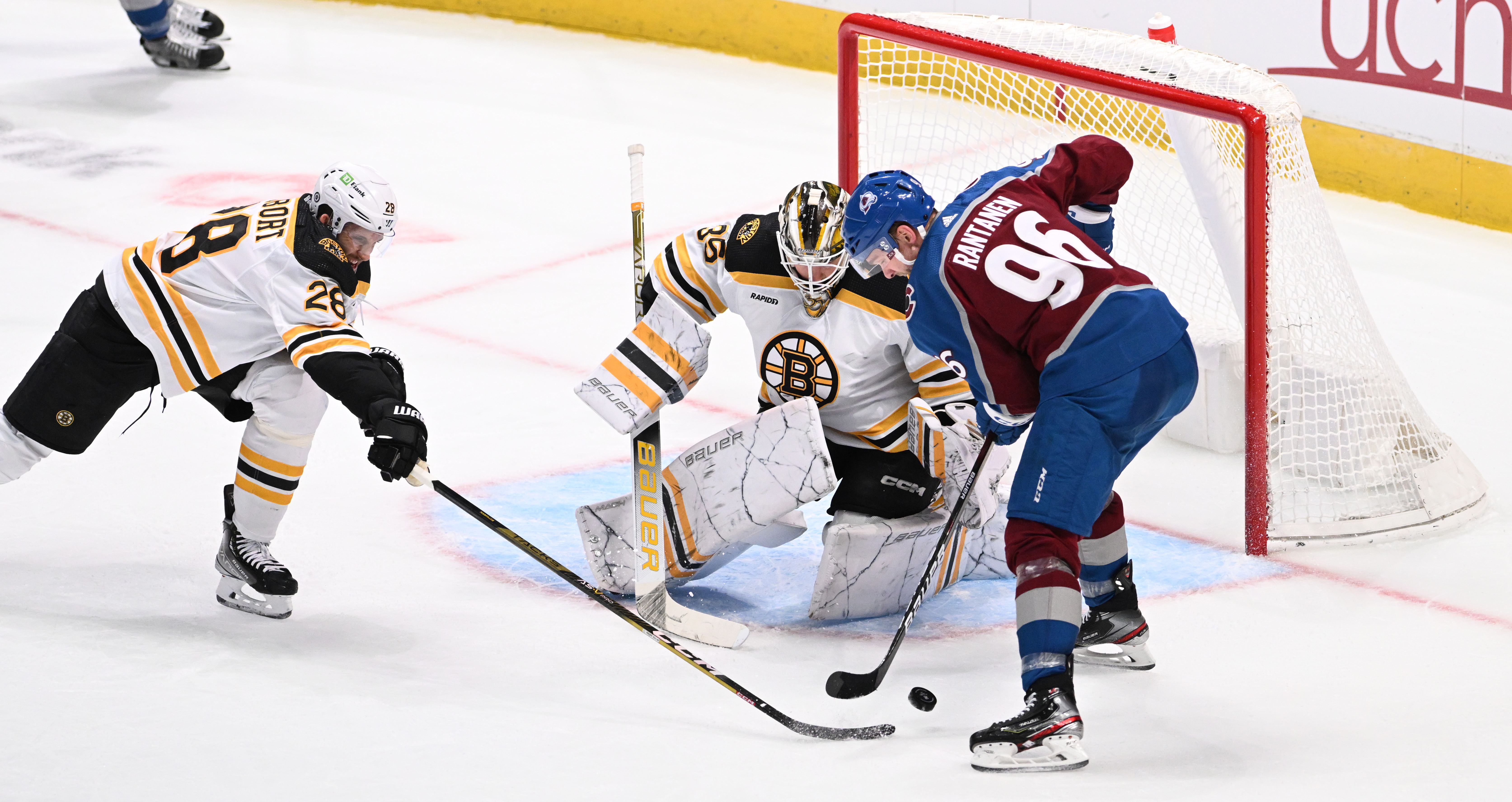 Colorado Avalanche right wing Mikko Rantanen (96) tries to score as Boston Bruins defenseman Derek Forbort (28) and goaltender Linus Ullmark (35) defend during the second period Wednesday, Dec. 7, 2022, at Ball Arena in Denver. (The Gazette, Christian Murdock) (Christian Murdock/The Gazette)