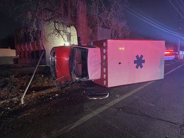 Stolen jeep collides with ambulance in Lakewood, injuring two firefighters