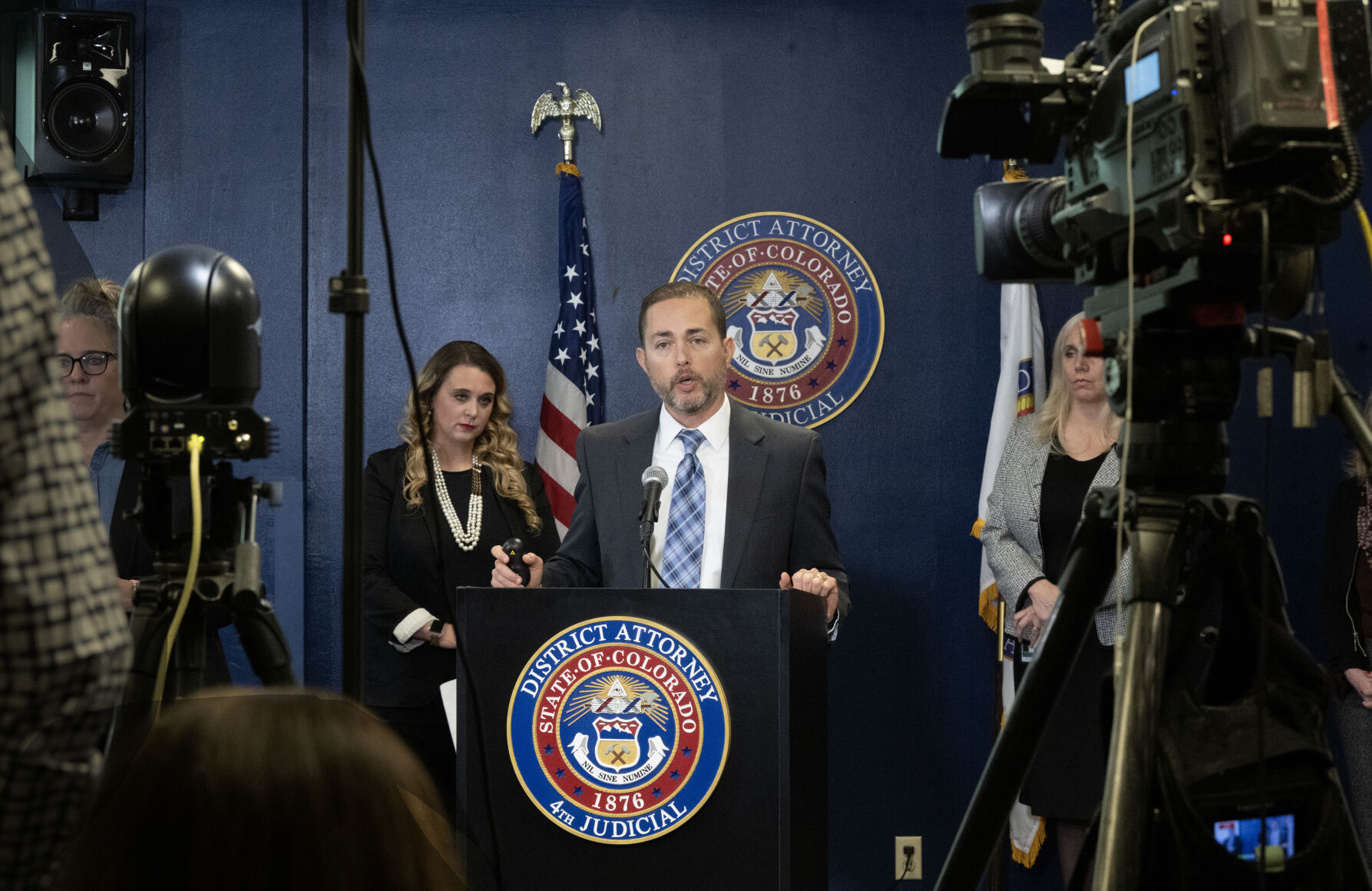 El Paso County D.A. Michael Allen held a press conference after a prior case involving alleged Club Q shooter Anderson Aldrich was unsealed on Thursday, Dec. 8, 2022. The unsealing was a result of petitions by Allen as well as numerous media outlets. Additionally, Allen revealed during the news conference that two guns were recovered and seized by the El Paso County Sherriff’s Office at the scene of the incident on June 18, 2021. Aldrich requested to get back this rifle and a pistol that were confiscated, but Sheriff Elder refused and the weapons are still in evidence. On the screen is one of the weapons, a MM-15 5.56mm rifle. (Photo by Jerilee Bennett, The Gazette)