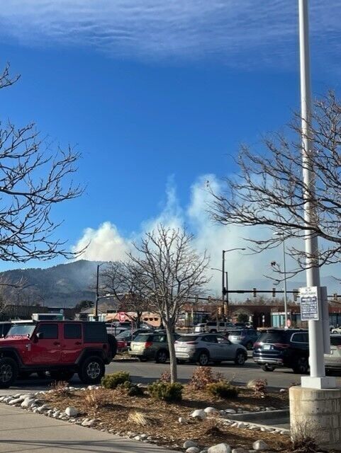 Smoke clearly visible on the west side of Boulder. This picture was taken from the Target parking lot off Pearl and 28th streets. The Boulder County Sheriff's office ordered evacuations to those in the 2900 block of Sunshine Canyon. (KYLA PEARCE/THE DENVER GAZETTE)