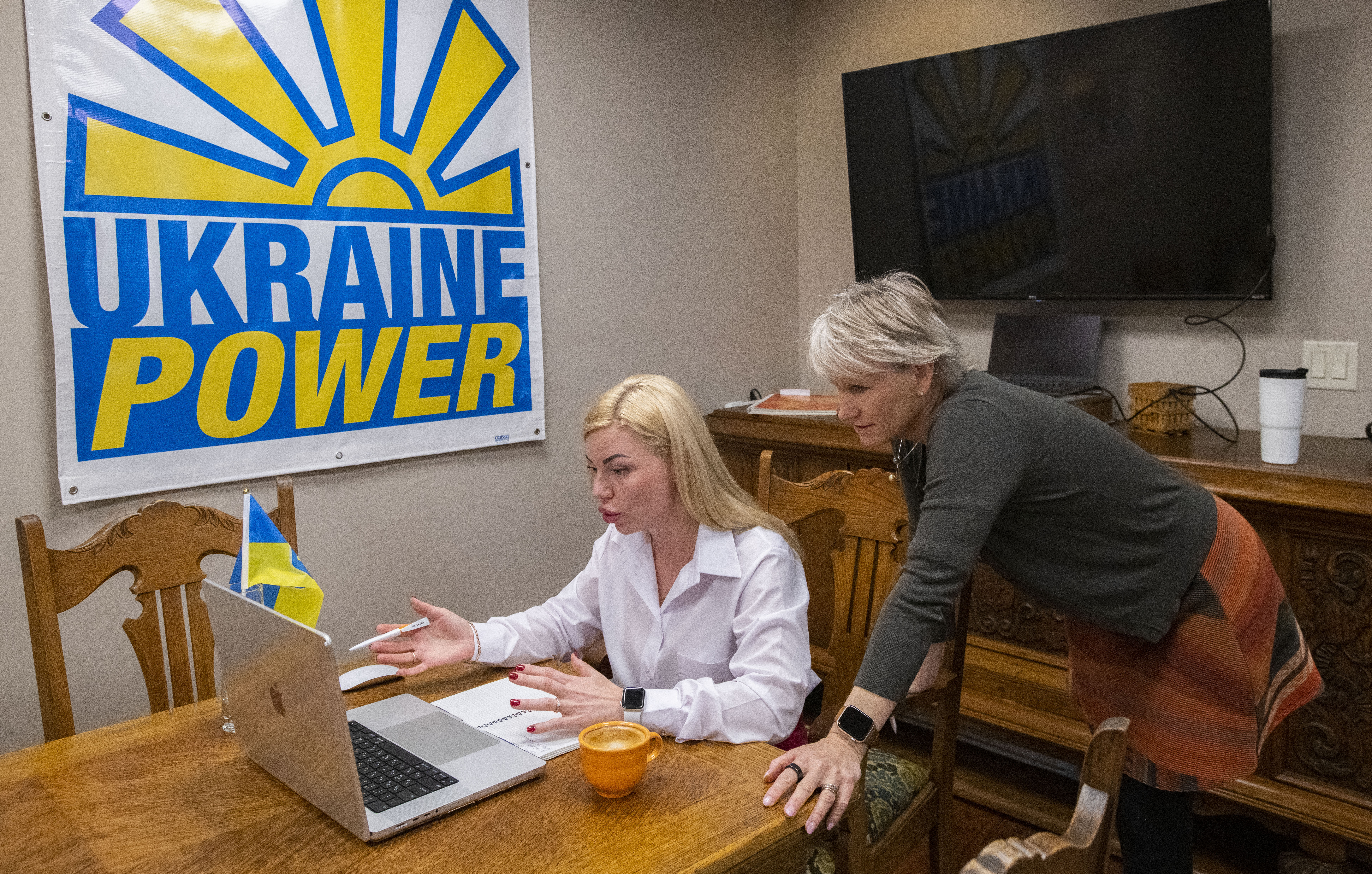 Yana Malyk, left, and her American sponsor Whitney Luckett meet with Renew Democracy Initiative in New York via a zoom call Wednesday, Dec. 7, 2022, from Luckett's Colorado Springs office. Malyk with her Ukraine connections and the Lucketts with their international shipping company, Simke North American, are working to send generators back to the Malyk's homeland, Luhansk region of eastern Ukraine. (The Gazette, Christian Murdock) (CHRISTIAN MURDOCK/THE GAZETTE)