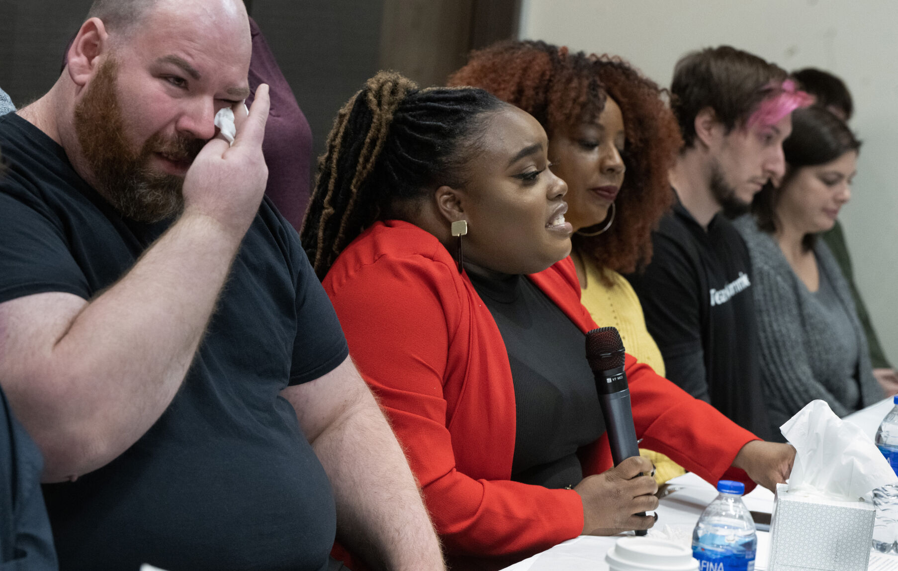 Advocacy for Club Q victimsPulse nightclub shooting survivor Christopher Hanson becomes emotional while fellow Pulse survivor Tiara Parker addresses the media during a news conference Sunday. They were a part of a group of survivors whose mission is to be an advocate for the victims of Club Q to receive 100% of any donations. The survivors traveled from all over the country and were victims from the Pulse nightclub to the Las Vegas shooting to the Aurora Theatre shooting. Parker sustained multiple gunshot wounds and watched her cousin die in her arms during the Pulse nightclub shooting in Orlando, Fla. Story, A6 (Jerilee Bennett, The Gazette)