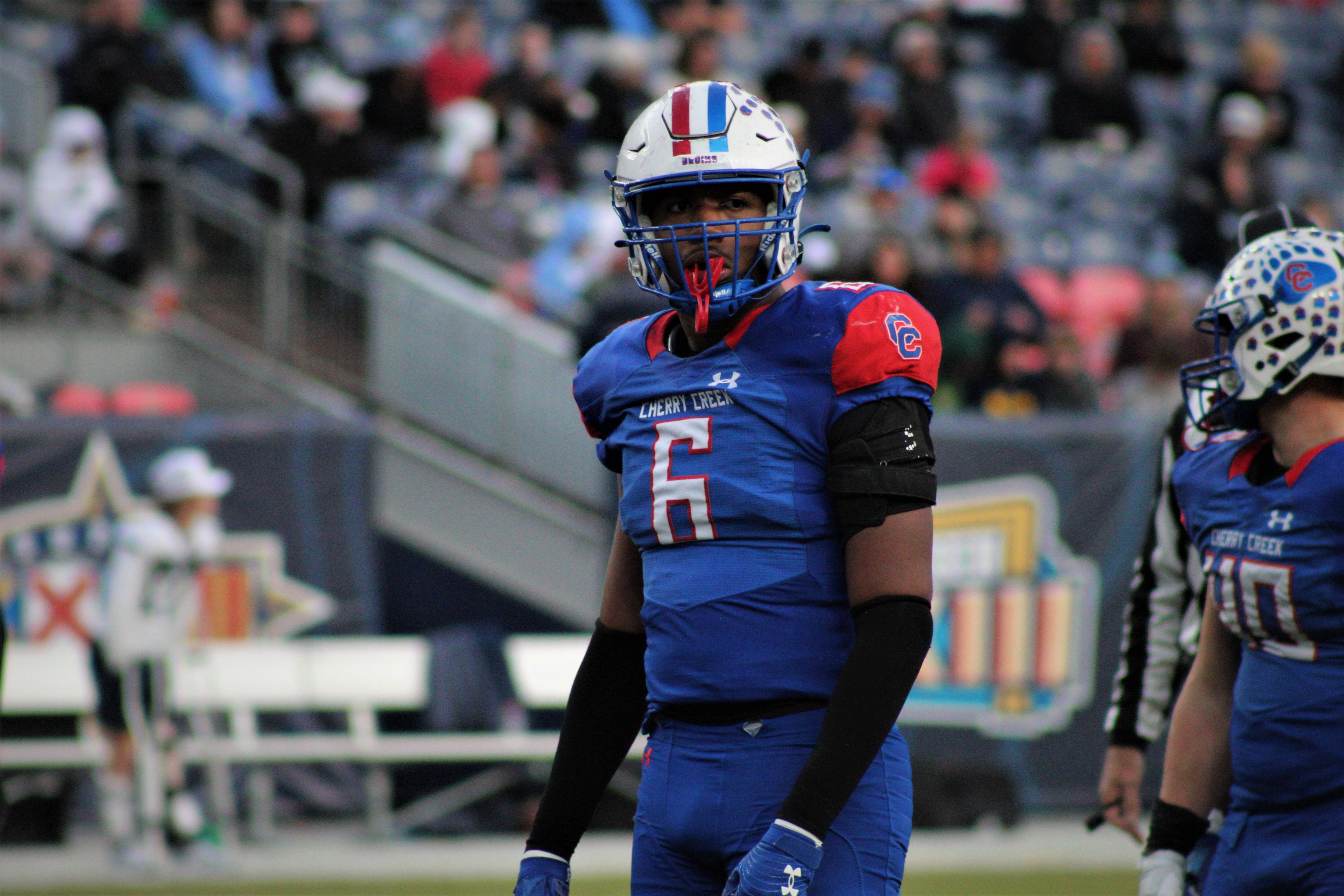 Cherry Creek defensive lineman Javion Smith-Combs, a Colorado State commit, prepares for the snap in the CHSAA 5A Championship Game against Valor Christian on Saturday, Dec. 3, 2022 at Empower Field at Mile High in Denver. (Tyler King, The Denver Gazette)
