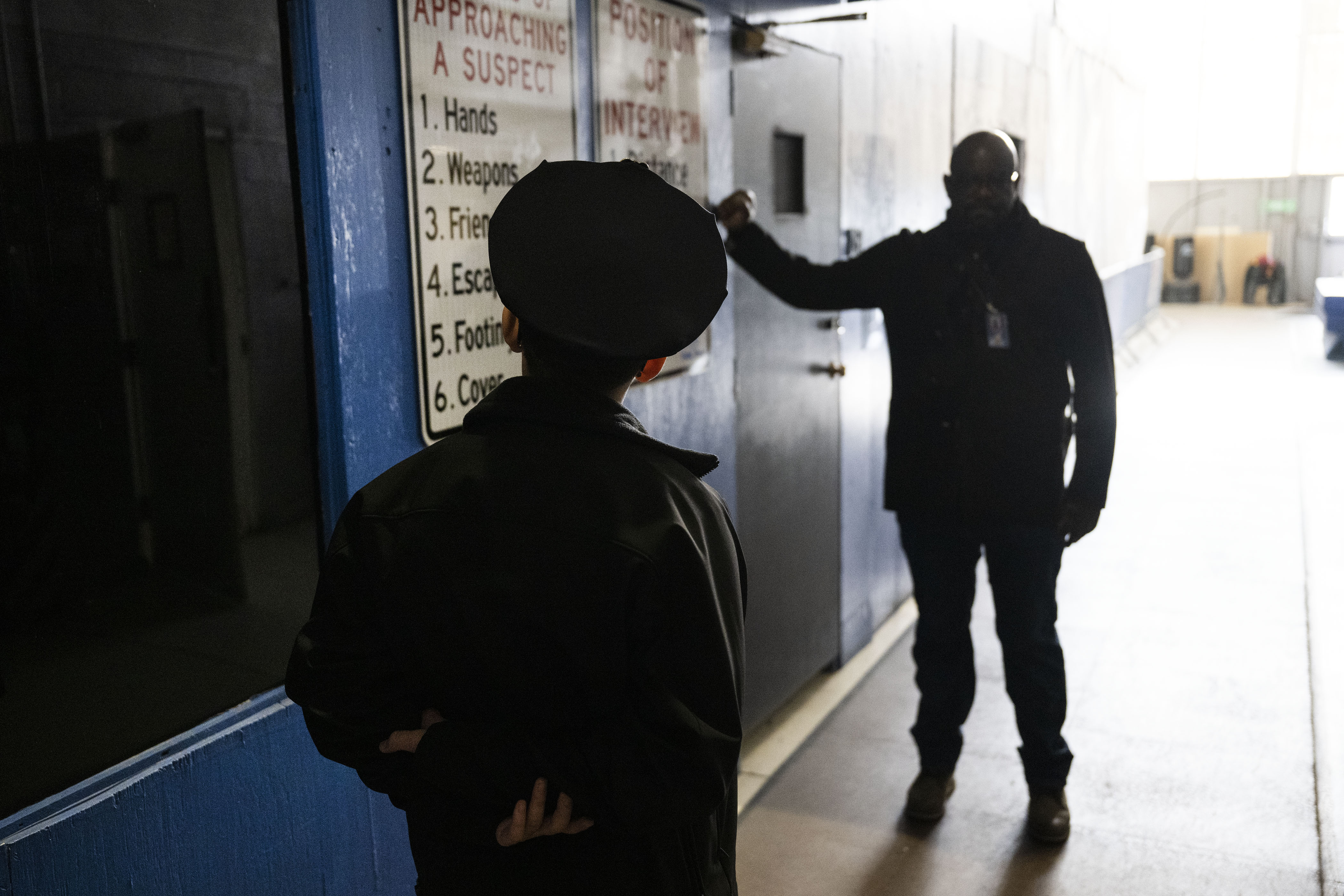 Kamorin, 14, no last name given, listens as Denver Police technician Tyrone Campbell talks about the training building they’ll be walking through after a simulated ride along on Friday, Dec. 23, in Denver, Colo. On August 22, 2022, Kamorin was being driven home from school when a bullet fired nearby hit him in the arm. Denver police arrived and performed initial first aid. (Timothy Hurst/The Denver Gazette) (TimHursttim.hurst@gazette.comhttps://secure.gravatar.com/avatar/aca82bd62b4ee425c598527cd6faa1b1?d=mm&r=g)