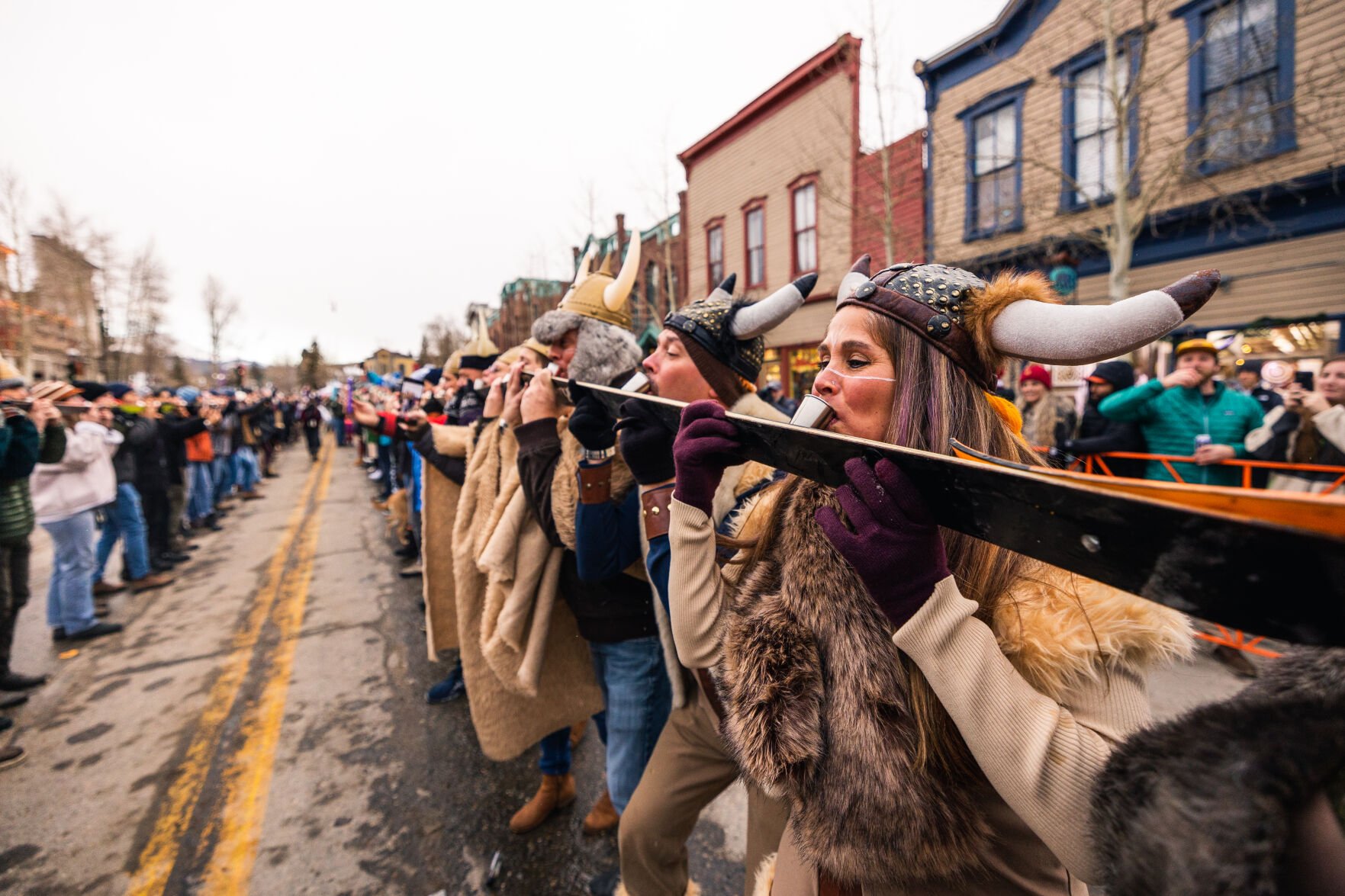 Partygoers join on the Shotski at the annual Breckenridge Ullr Fest, which hopes to break the record this year for world's longest Shotski. (Courtesy of Breckenridge Tourism Office.)