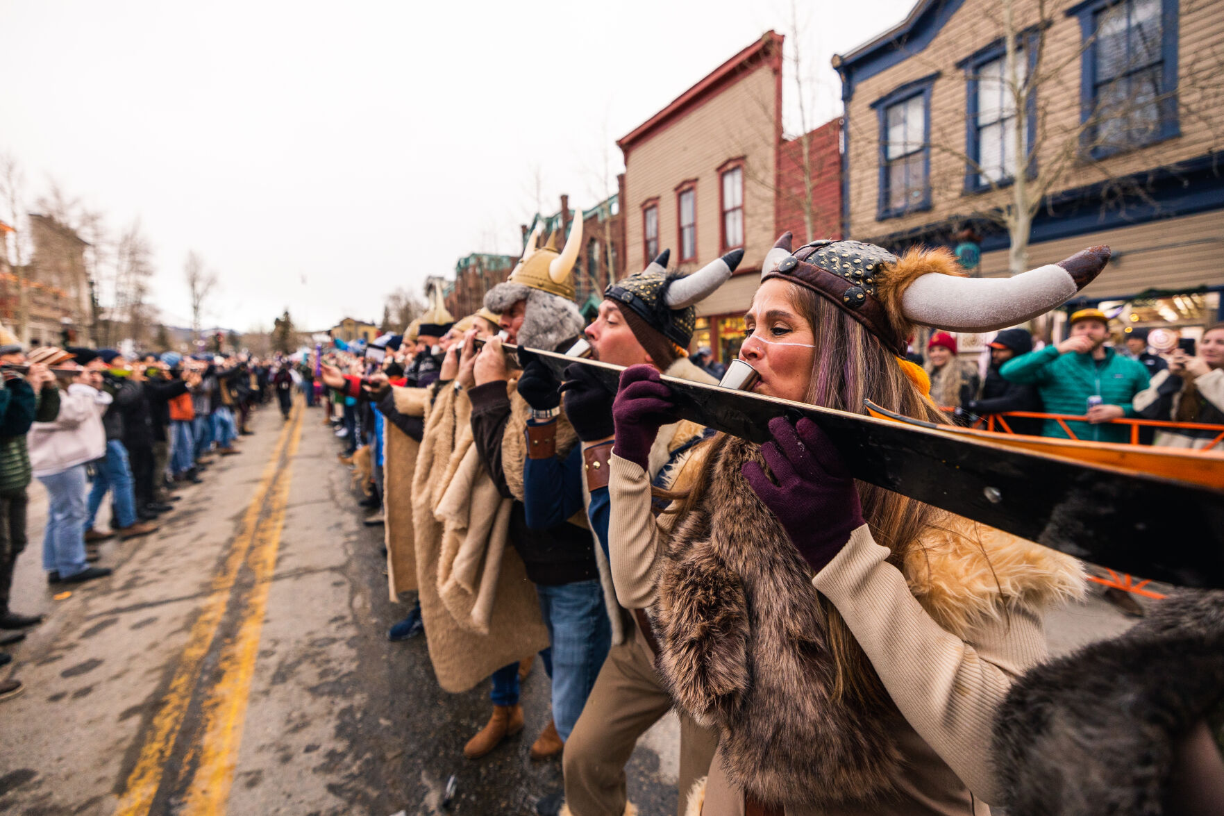 Partygoers join on the Shotski at the annual Breckenridge Ullr Fest, which hopes to break the record this year for world's longest Shotski. (Courtesy of Breckenridge Tourism Office.)